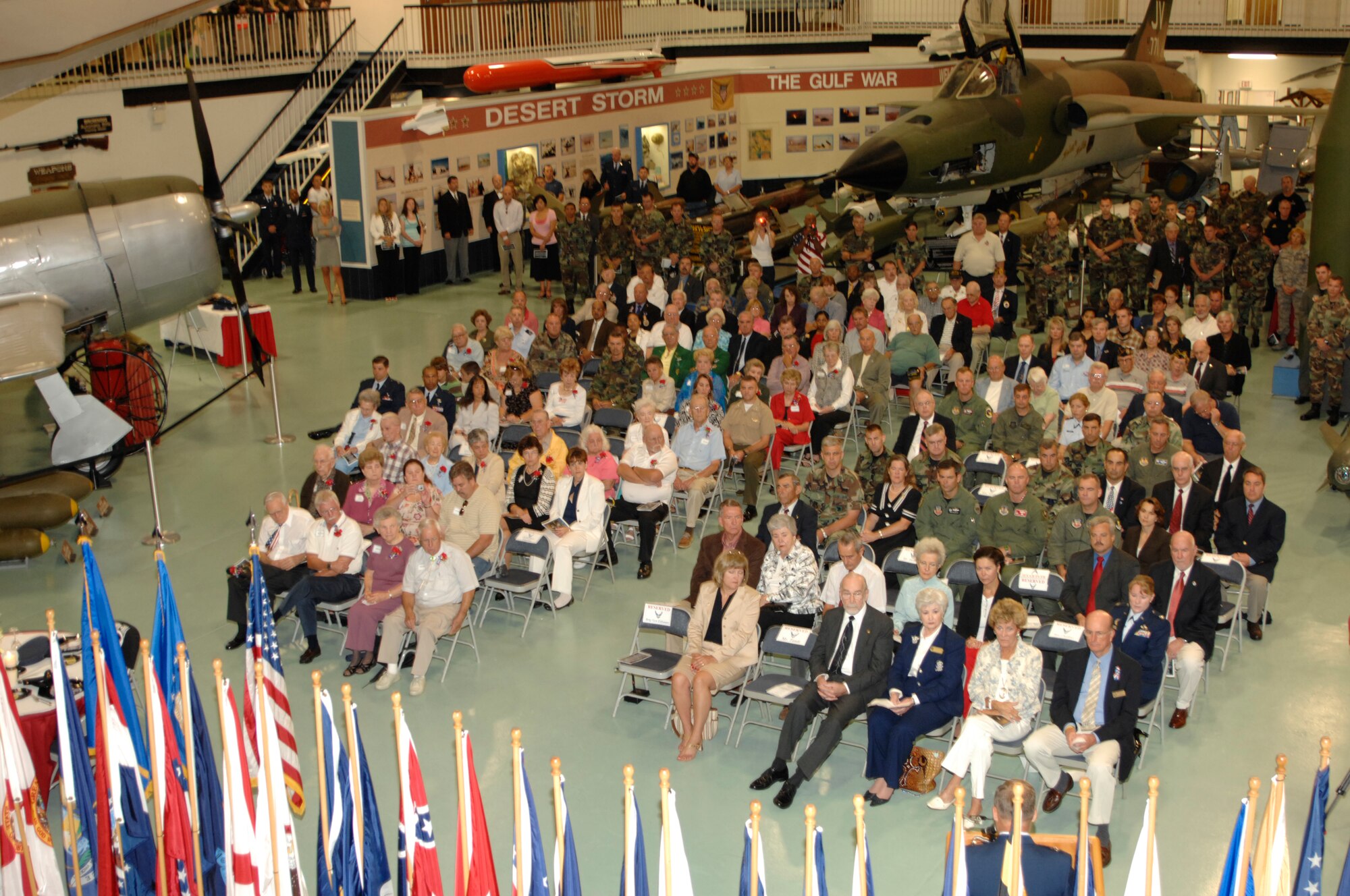 EGLIN AIR FORCE BASE, Fla. -- The Air Force Armament Museum hosted the annual Prisoner of War Missing in Action Recognition Day ceremony Sept. 21st with more than 300 people in attendance. The ceremony ended outside the museum with the Addie Lewis Middle School students laying a wreath in honor of our missing comrades, a 21-gun salute and taps. (U.S. Air Force photo by Mike Fleck)