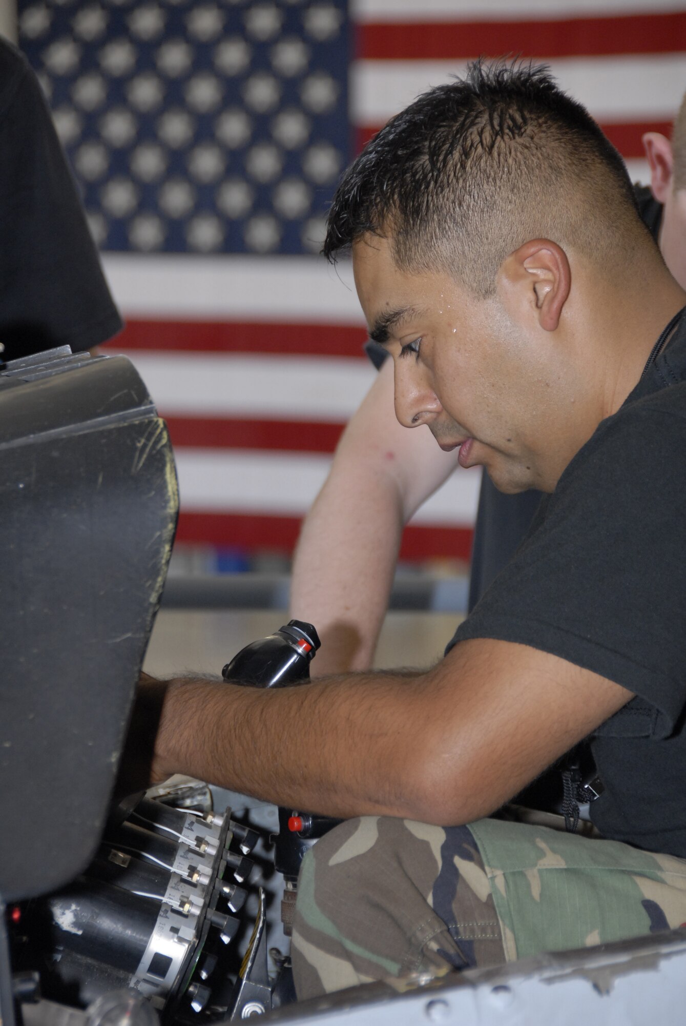 Senior Airman Ulisses Cortez rebuilds a connector on a horizontal situation indicator in an A-10 Thunderbolt II at Whiteman Air Force Base, Mo., Sept. 9, 2007.  Airman Cortez is an Air Force reservist in the 442nd Maintenance Group, part of the 442nd Fighter Wing, based at Whiteman.  The wing operates, maintains and supports a full squadron of 24 A-10, ground-attack aircraft.  (U.S. Air Force photo/Maj. David Kurle)