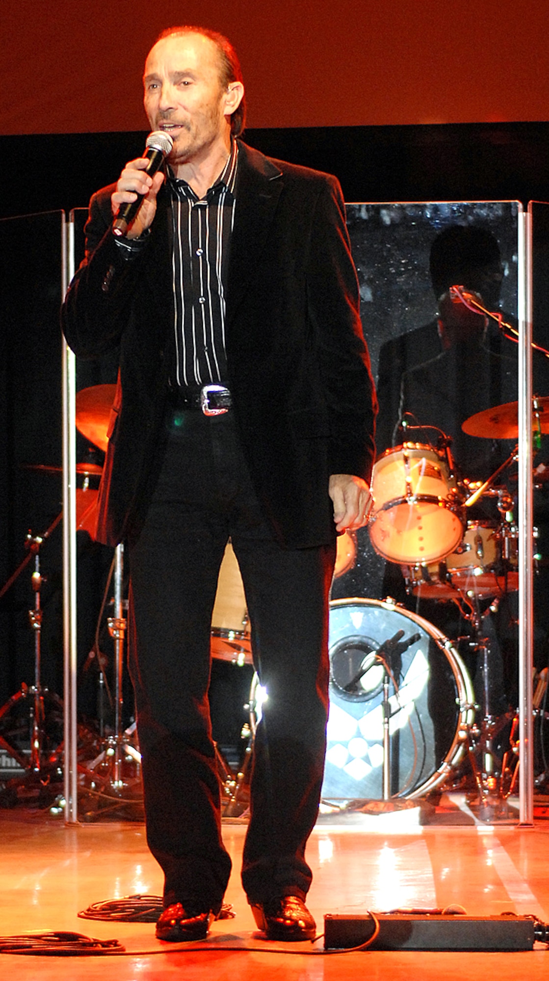 Two-time Country Music Association Male Vocalist of the Year and platinum-selling recording artist, Lee Greenwood, performs his patriotic anthem "God Bless the USA" at the New Mexico Air Force Bases 60th Anniversary Celebration at the Sandia Resort, Sept. 14.  U.S. Air Force photo by Todd Berenger