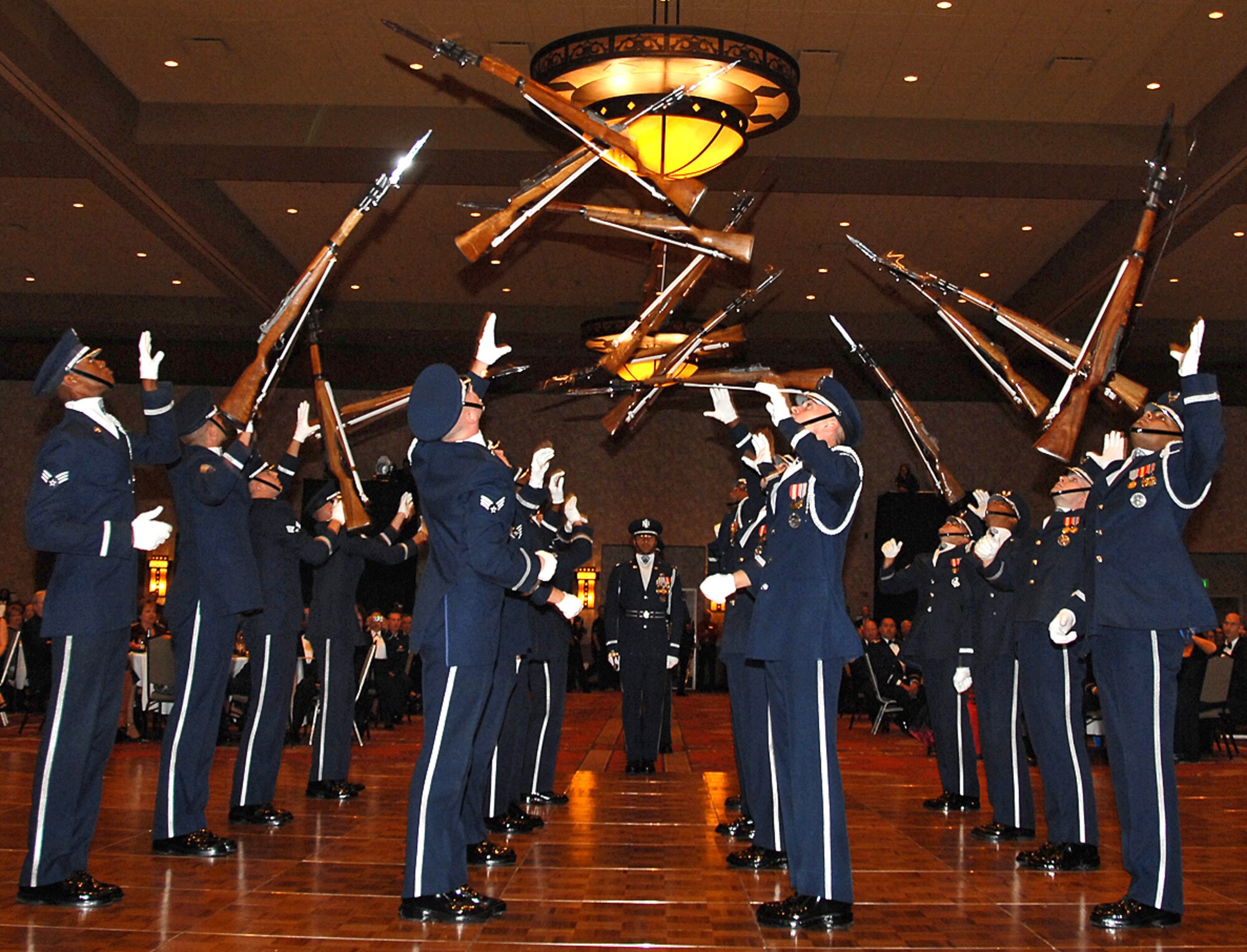 The U.S. Air Force Honor Guard Drill Team thrills the audience at the New Mexico Air Force Bases 60th Anniversary Celebration at Sandia Resort, Sept. 14. U.S. Air Force photo by Todd Berenger