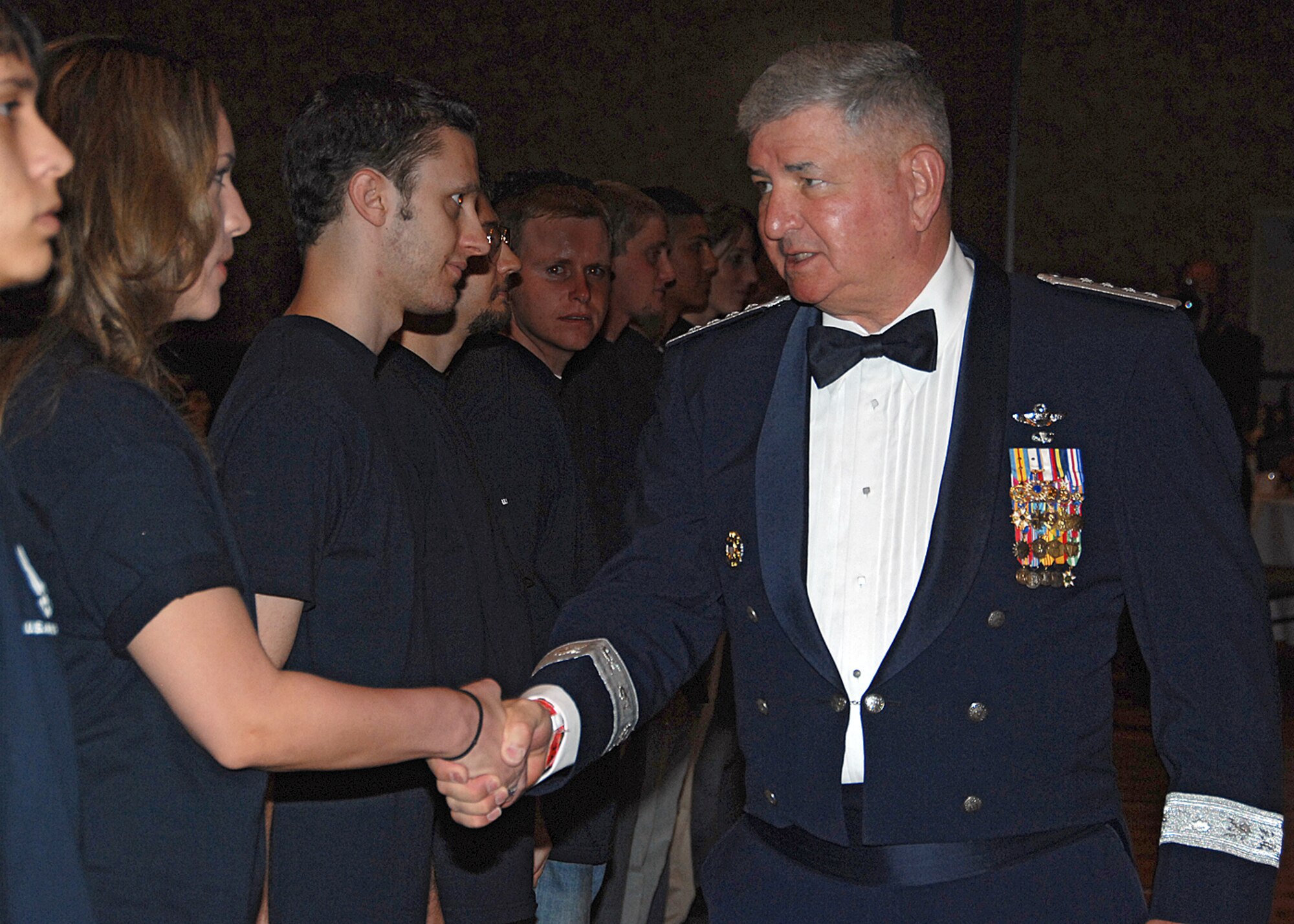 Former Air Force Chief of Staff, retired Gen. Ronald Fogleman, welcomes delayed-enlistees to the U.S. Air Force during the New Mexico Air Force Bases 60th Celebration in Sandia Resort, Sept. 14. U.S. Air Force photo by Todd Berenger.