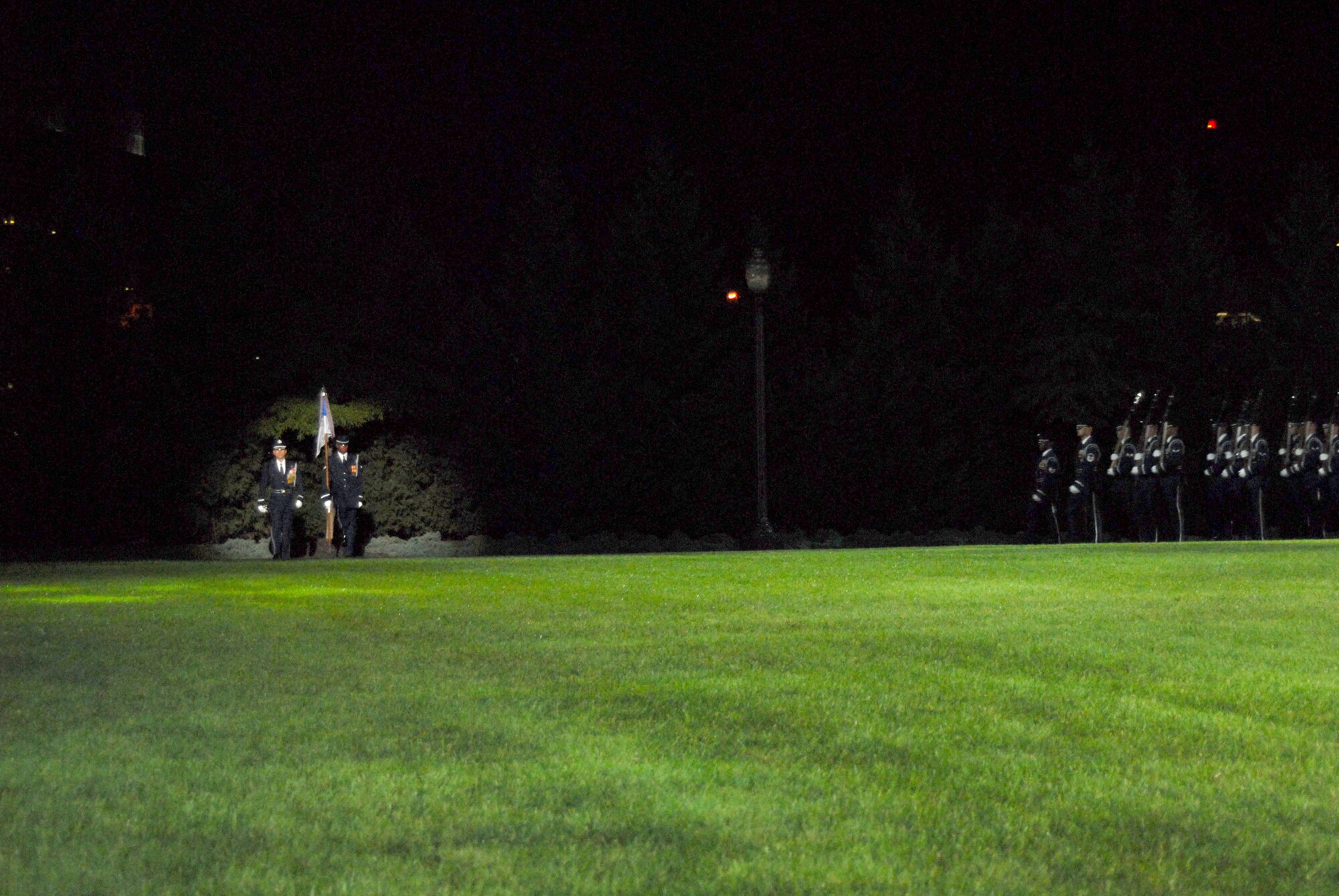 BOLLING AFB, D.C. -- Lt. Col. Anthony Taylor, Air Force Honor Guard commander, leads ceremonial guardsmen from the Air Force Honor Guard for a pass and review during the dress rehearsal for the Air Force 60th Anniversary Tattoo Sept. 22.
The military tattoo, which is held annually at Bolling, highlights troop excellence and readiness.  The tattoo dates back to the mid-17th century British Army deployment to the Netherlands in which drummers were sent from the garrison to the towns at 9:30 each night to let soldiers know it was time to return to the fort.
(U.S. Air Force photo by Staff Sgt. Madelyn Waychoff)