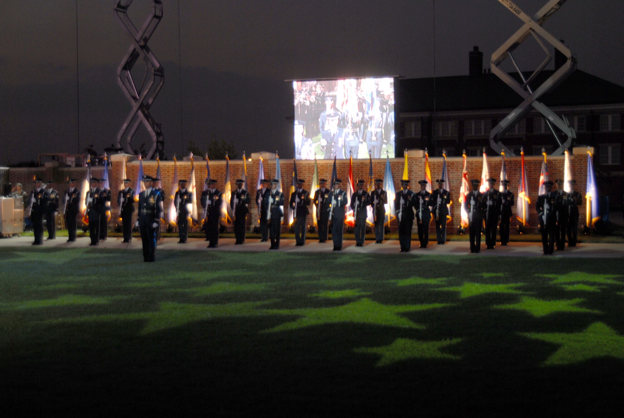 BOLLING AFB, D.C. -- Airmen from the Air Force Honor Guard stand ready in formation before performing marching orders and rifle manuals at the 60th Anniversary Air Force Tattoo dress rehearsal Sept. 22.
The military tattoo, which is held annually at Bolling, highlights troop excellence and readiness.  The tattoo dates back to the mid-17th century British Army deployment to the Netherlands in which drummers were sent from the garrison to the towns at 9:30 each night to let soldiers know it was time to return to the fort.
(U.S. Air Force photo by Staff Sgt. Madelyn Waychoff)