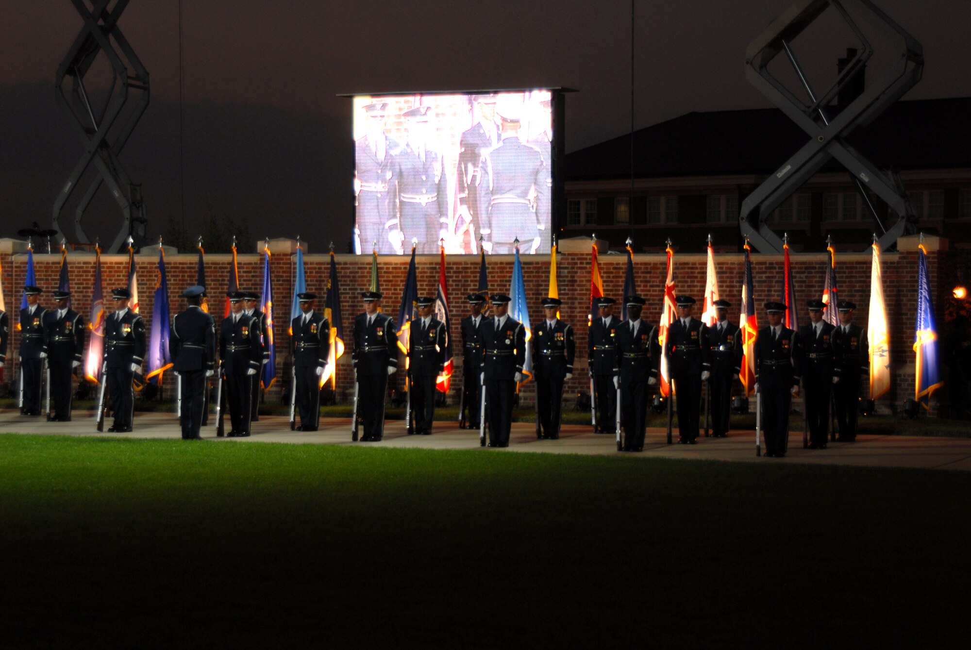 BOLLING AFB, D.C. -- Airmen from the Air Force Honor Guard stand ready in formation before performing marching orders and rifle manuals at the 60th Anniversary Air Force Tattoo dress rehearsal Sept. 22.
The military tattoo, which is held annually at Bolling, highlights troop excellence and readiness.  The tattoo dates back to the mid-17th century British Army deployment to the Netherlands in which drummers were sent from the garrison to the towns at 9:30 each night to let soldiers know it was time to return to the fort.
(U.S. Air Force photo by Staff Sgt. Madelyn Waychoff)