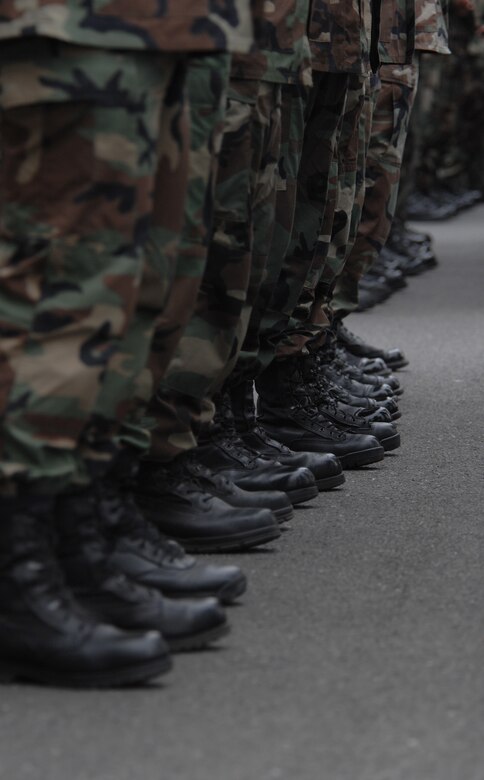 RAF Mildenhall Airmen stand in formation for the retreat ceremony during the annual Prisoner of War/Missing in Action week of remembrance, Sept. 21, 2007.
(U.S. Air Force photo by Tech. Sgt. Tracy L. DeMarco)
