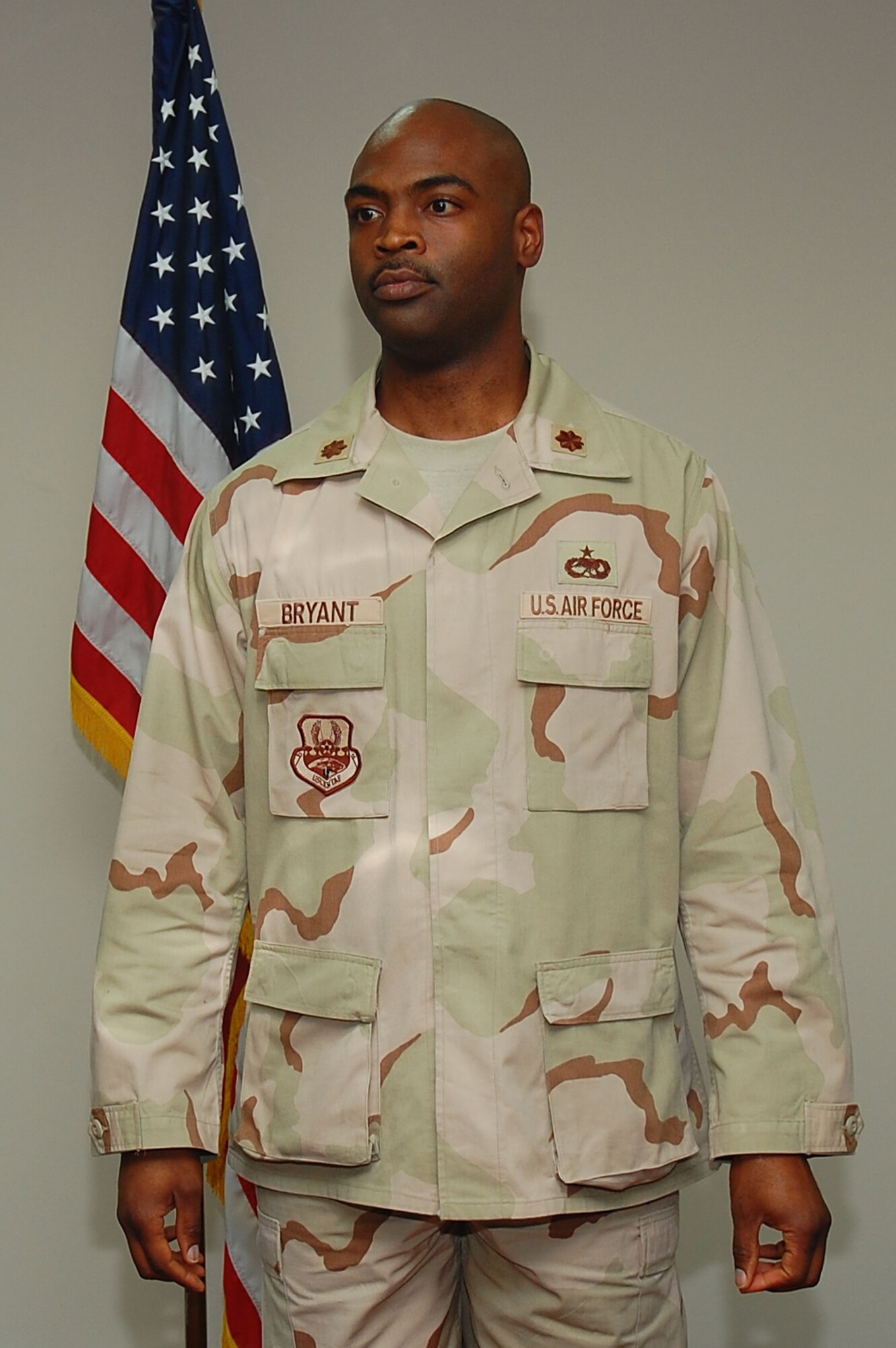 SOUTHWEST ASIA -- 386th Expeditionary Maintenance Squadron change of command.  Maj. Emille Bryant assumed command of the squadron from Maj. Konrad Cote here Sept. 24.  (U.S. Air Force photo by Staff Sgt. Tia Schroeder)