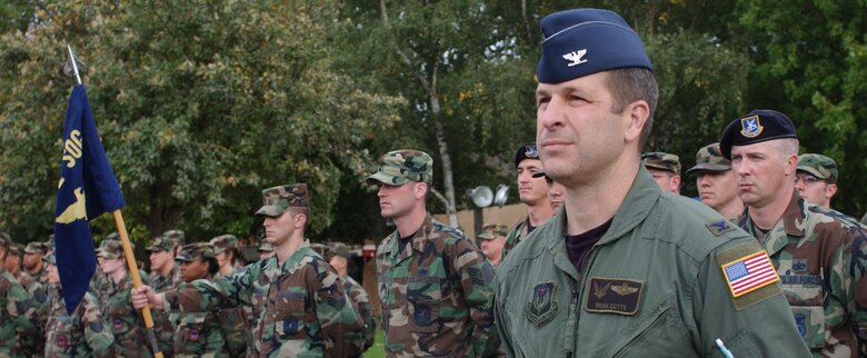 Col. Brian Cutts, 352nd Special Operations Group commander, leads his unit during a Retreat ceremony Sept. 21 at RAF Mildenhall. The Retreat ceremony was the last of the base's annual prisoner of war, missing in action observance activities. (U.S. Air Force photo by Airman Brad Smith)