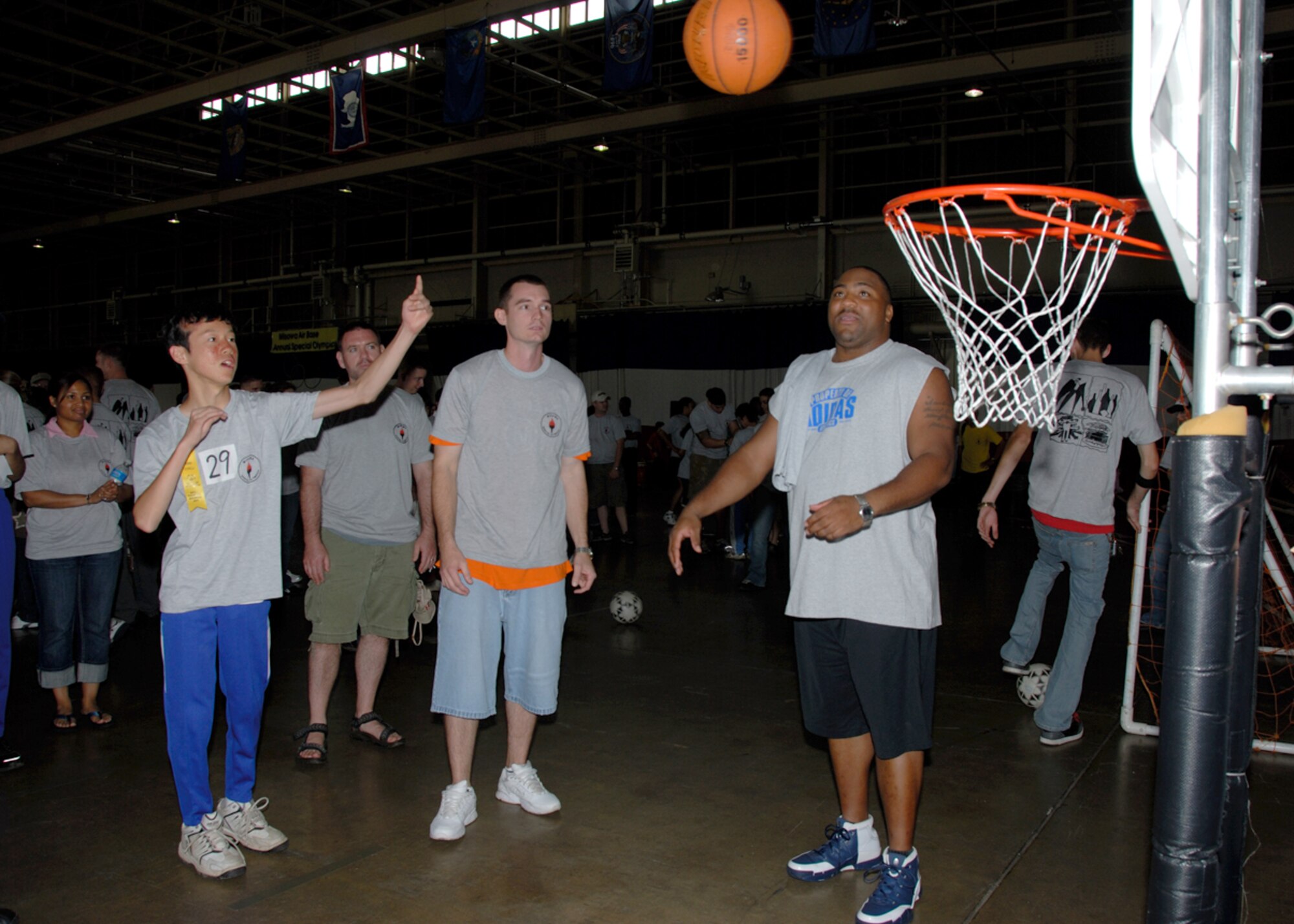MISAWA AIR BASE, Japan -- Nineteen year old Manabu Furuyasaki from the Mominoke-Gakuen school sends the ball across the court during the 2007 Special Olympics on here Sept. 22. The Special Olympics are held annually to promote relations between the American forces serving in Japan and the surrounding community.  (U.S. Air Force photo by Senior Airman Laura R. McFarlane)

