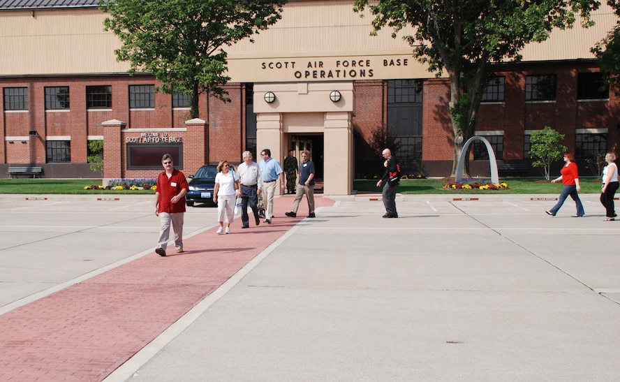 Civilian bosses of 932nd Airlift Wing Reservists make the final turn onto the red "carpet" at Scott Ari Force Base before boarding a C-9C for an orientation flight.  Photo/ Tech. Sgt. Gerald Sonnenberg.