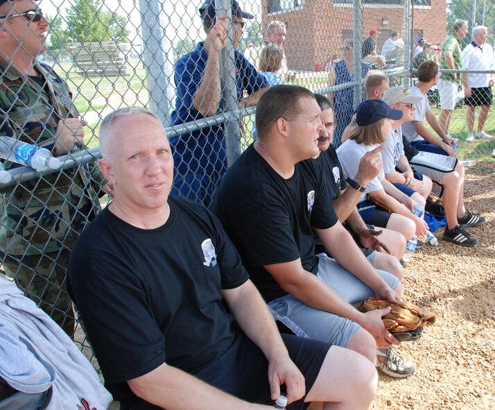 Hey there batter!  An enlisted member of the 932nd Airlift Wing prepares to come off the bench and catch a ball at the recent softball match.