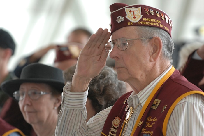 Charles "Rut" Murray salutes during the POW/MIA ceremony at Charleston AFB Sept. 21. (Air Force photo/James Bowman)
