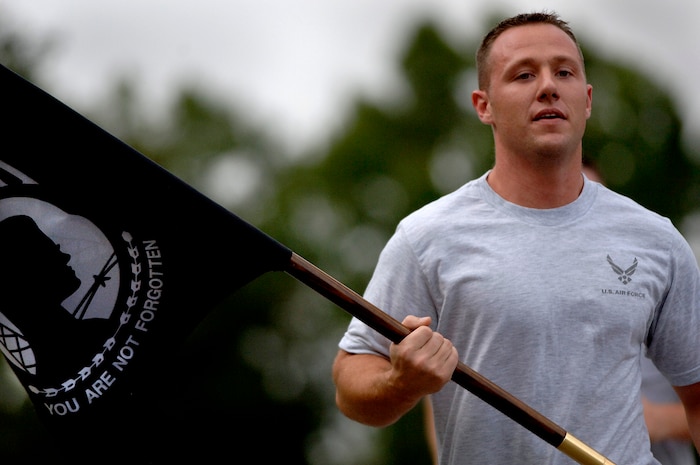 Staff Sgt. Doug Berry, 437th Aircraft Maintenance Squadron avionics technician, Honors our fallen comrades that are missing in action and have been prisoners of war by running in a 24 hour vigil run that took place on Charleston AFB Sept. 20 and 21. (U.S. Air Force photo/Airman 1st Class Nicholas Pilch)