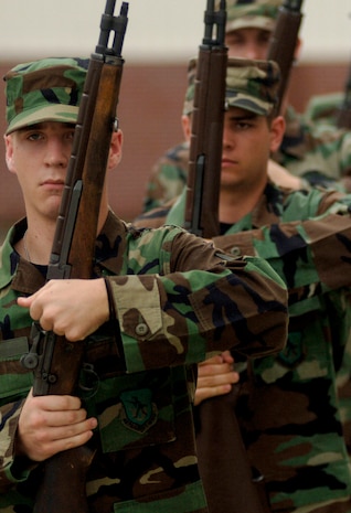 Members of the Team Charleston Honor Guard honor comrades who are missing in action and those who have been prisoners of war by performing a 21-gun salute Sept. 21 on Charleston AFB, S.C.(U.S. Air Force photo/Airman 1st Class Nicholas Pilch)
