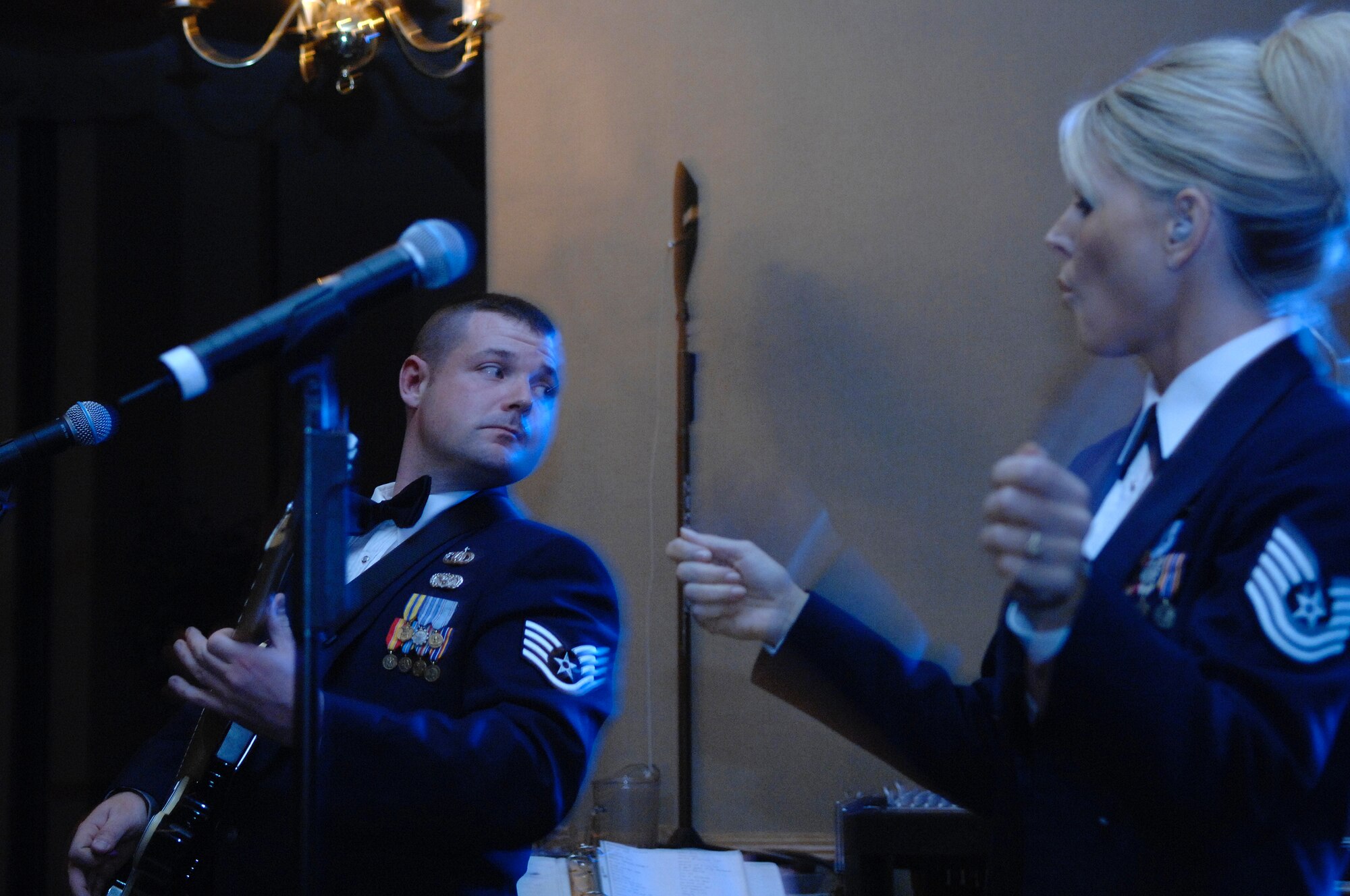 Technical Sergeant Lara Murdzia, vocalist, and Staff Sergeant Daniel Bragdon, guitarist, for Night Wing, of the United States Air Force Heartland of America Band, perform during the Air Force Ball at Ellsworth Air Force Base, S.D., Sept. 22, 2007. Ellsworth is hosting this ball in commemoration of the Air Force's 60th anniversary. (U.S. Air Force photo by SSgt Michael B. Keller)