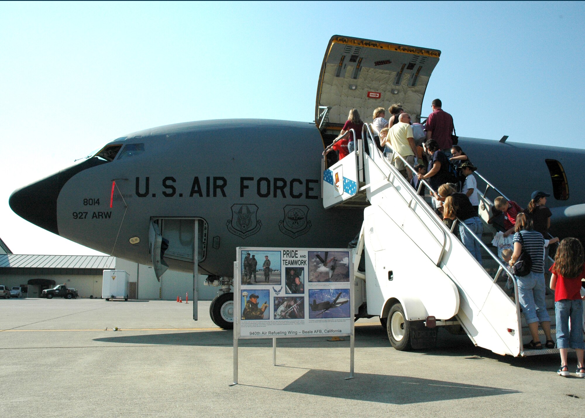 Air Force families wait for their turn to tour the 940th Air Refueling Wing's KC-135 Stratotanker during the Junior Deployment Line and Family AEF Fair Sept. 8, 2007 at Beale Air Force Base, Calif. The event introduced military families to the deployment process, support programs and gave an idea of deployed life. The 940th ARW is an Air Force Reserve unit stationed at Beale.