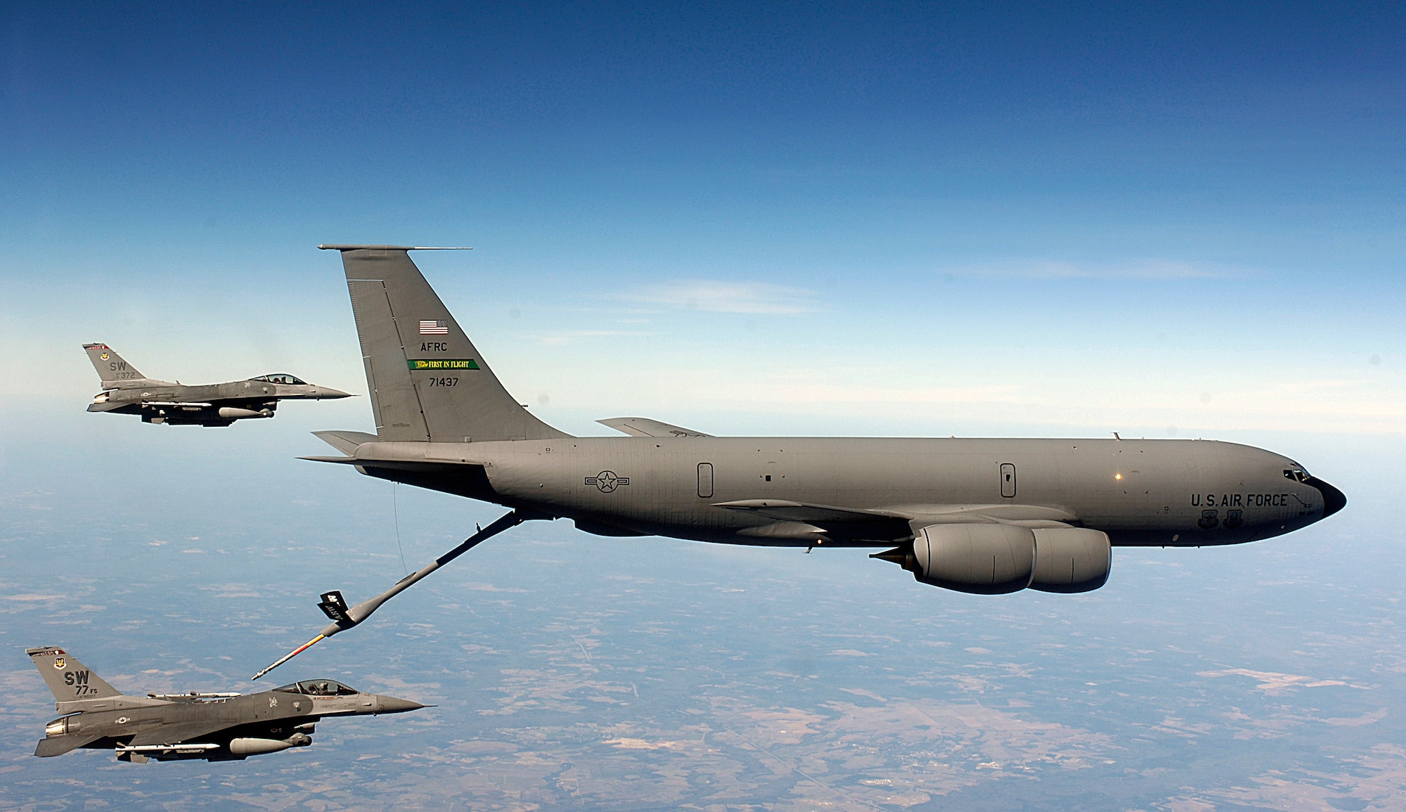 A KC-135 Stratotanker refuels an F-16 Fighting Falcon in this stock photo. The same types of aircraft were used April 6 to trail a stolen Cessna that crossed into the U.S. from Canada and landed in Missouri after a seven-hour ordeal. The KC-135 that supported the F-16s operated under command and control of the 618th Tanker Airlift Control Center, Air Mobility Command's hub for worldwide airlift, air refueling and aeromedical evacuation operations. (U.S. Air Force photo/Staff Sgt. Suzanne Day)
