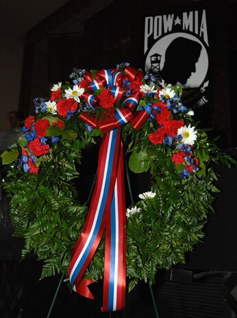 Placing of a memorial wreath is an important part of the POW/MIA day. It is a tradition of showing honor to those military service men and women who have died in service to their country. (US Air Force Photo by Airman 1st Class Nadine Y. Barclay) 