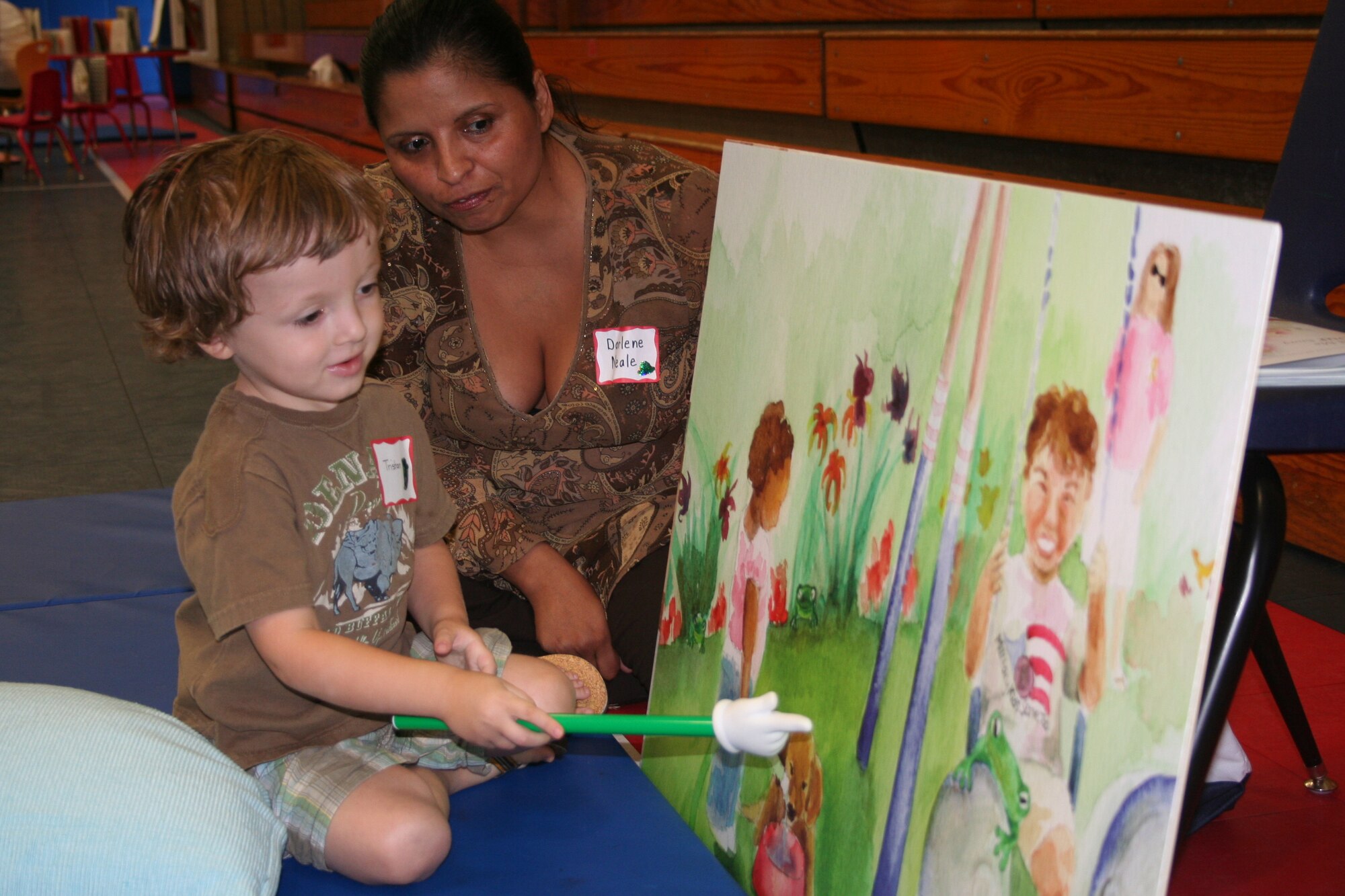 Tristan, 3, points to an enlarged picture during the Tell Me a Story kick off event, Sept. 22, 2007 at the Eglin Air Force Base Youth Center. The event focused on helping military children improve thier literary skills. (U.S. photo by Senior Airman Ali E. Flisek)