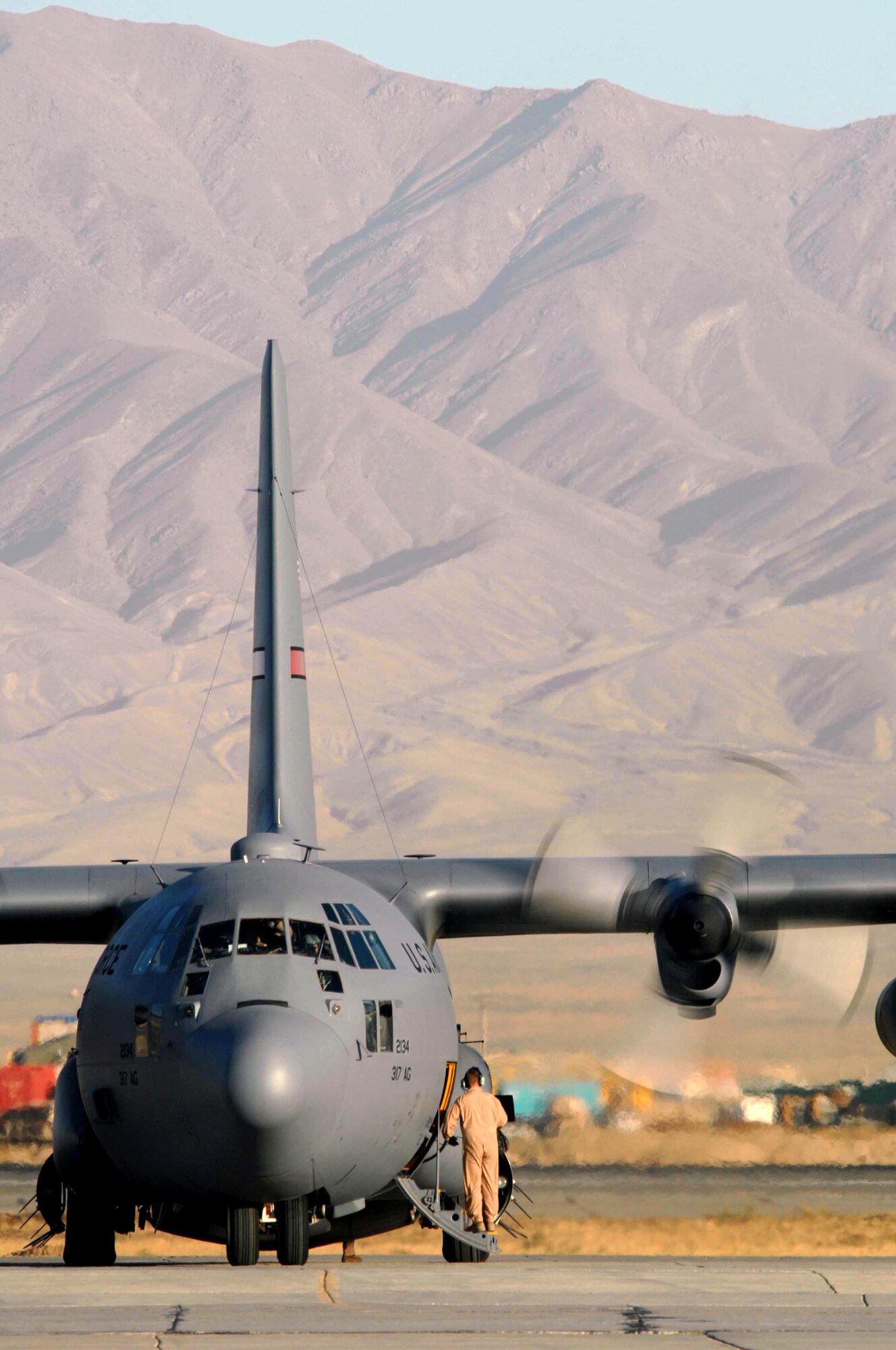 A C-130 Hercules from the 317th Airlift Group from Dyess Air Force Base, Texas, prepares to take off for an airlift mission in support of Operation Enduring Freedom Sept. 24 at Bagram Air Base, Afghanistan. C-130s are an essential part of the 455th Air Expeditionary Wing airlift capabilities within the area of responsibilities. These capabilities bring mission critical supplies to the joint fight in support of the war on terrorism. (U.S. Air Force photo/Staff Sgt. Joshua T. Jasper)