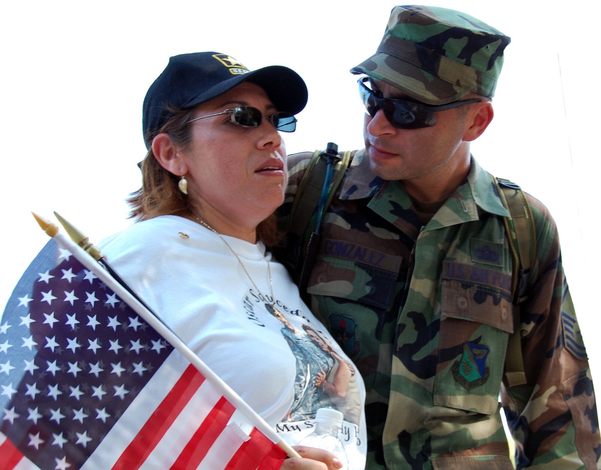 LAUGHLIN AIR FORCE BASE, Texas – Chief Master Sgt. Ruben Gonzalez, 47th Operations Group, comforts Sandra Hernandez, mother of Army Pvt. Oscar Sauceda Jr. (who was killed May 22 in Baghdad by small arms fire), during the  ceremony for National POW/MIA Recognition Day Sept. 21. (U.S. Air Force photo by Airman Sara Csurilla)