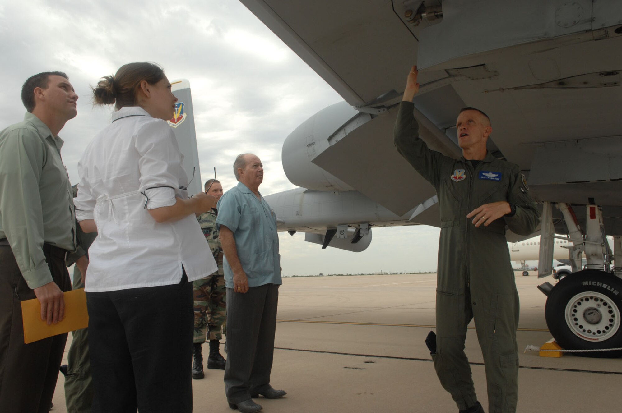 Col. Kent Laughbaum, 355th Fighter Wing commander, talks to a group of Honorary Commanders about an A-10 Thunderbolt II. (U.S. Air Force photo by Airman 1st Class Noah Johnson)