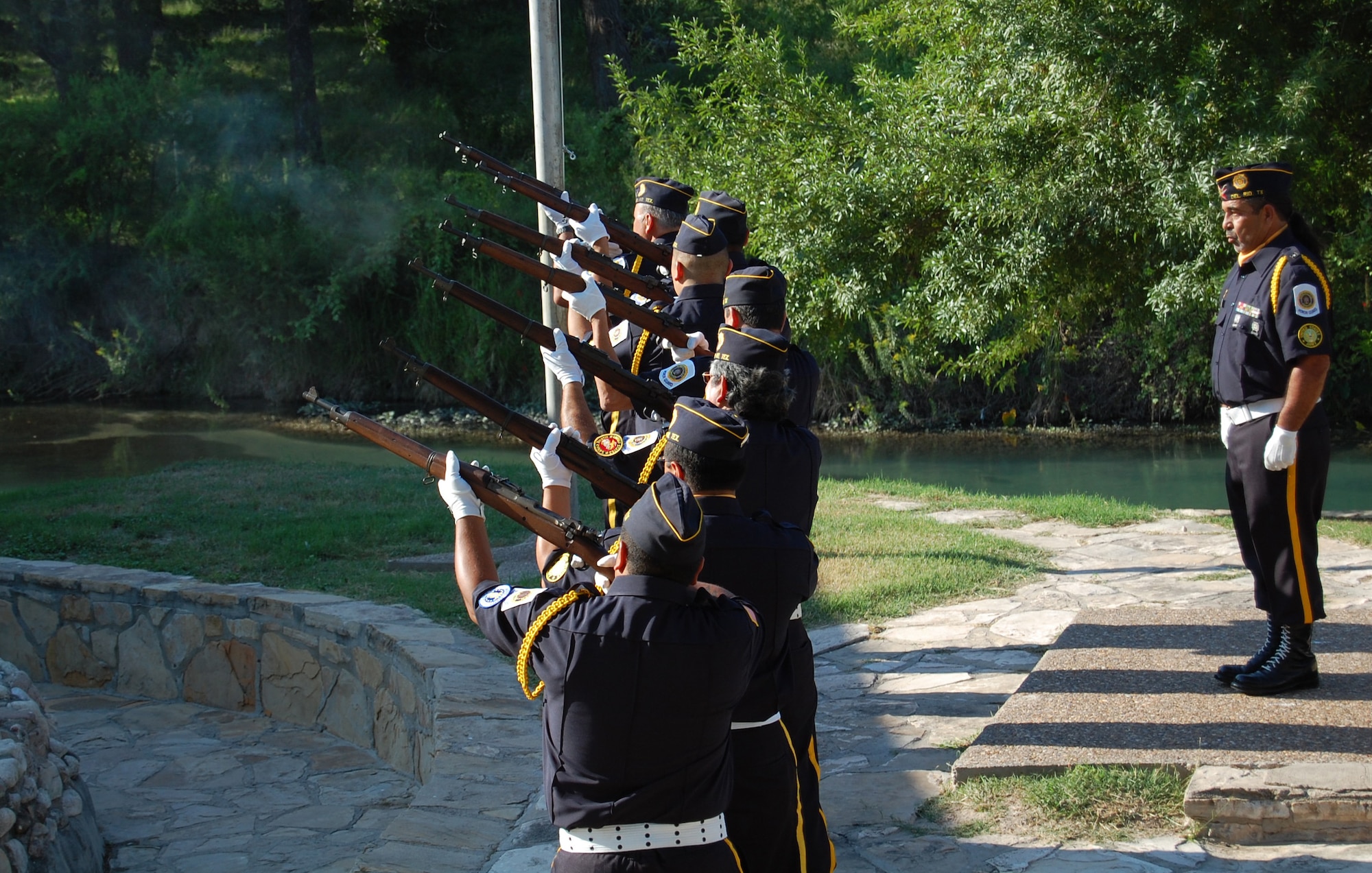 LAUGHLIN AIR FORCE BASE, Texas – Del Rio, Jesus m. Limones Jr. American Legion Post 595 Honor Guard members, performed a 21-gun salute as part of the ceremony for National POW/MIA Recognition Day Sept. 21. (U.S. Air Force photo by Airman Sara Csurilla)