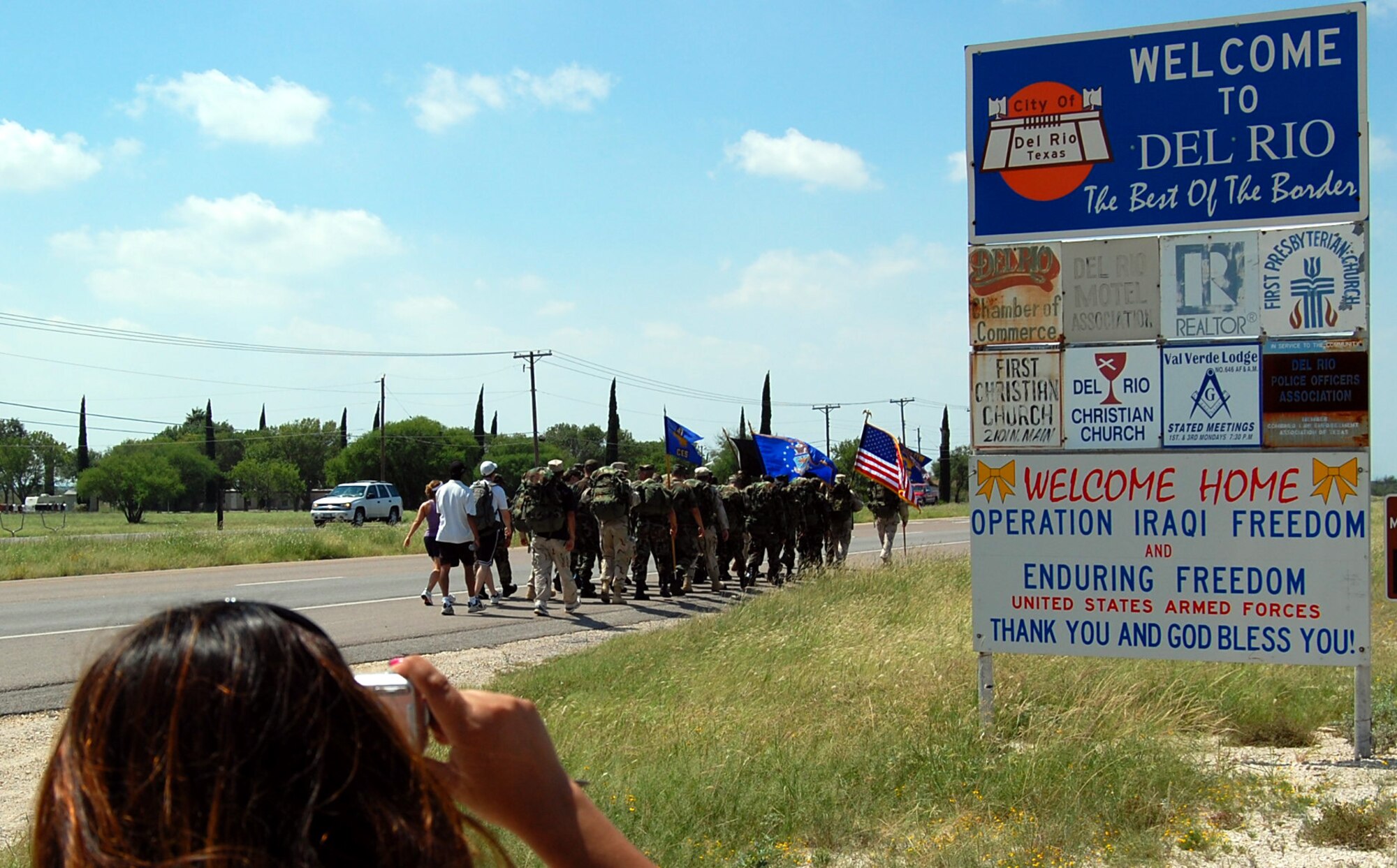 LAUGHLIN AIR FORCE BASE, Texas –Members from the 47th Security Forces Squadron and many other volunteers set off on Highway 90 in Del Rio, Texas for the beginning of a 7 mile walk inspired by National POW/MIA Recognition Day, and in honor of local fallen heroes such as Airman 1st Class Raymond Losano, Army Pvt. Oscar Sauceda Jr. and Army Staff Sgt. Jose Lanzarin, Sept. 21. (U.S Air Force photo by Tech. Sgt. Joel Langton)