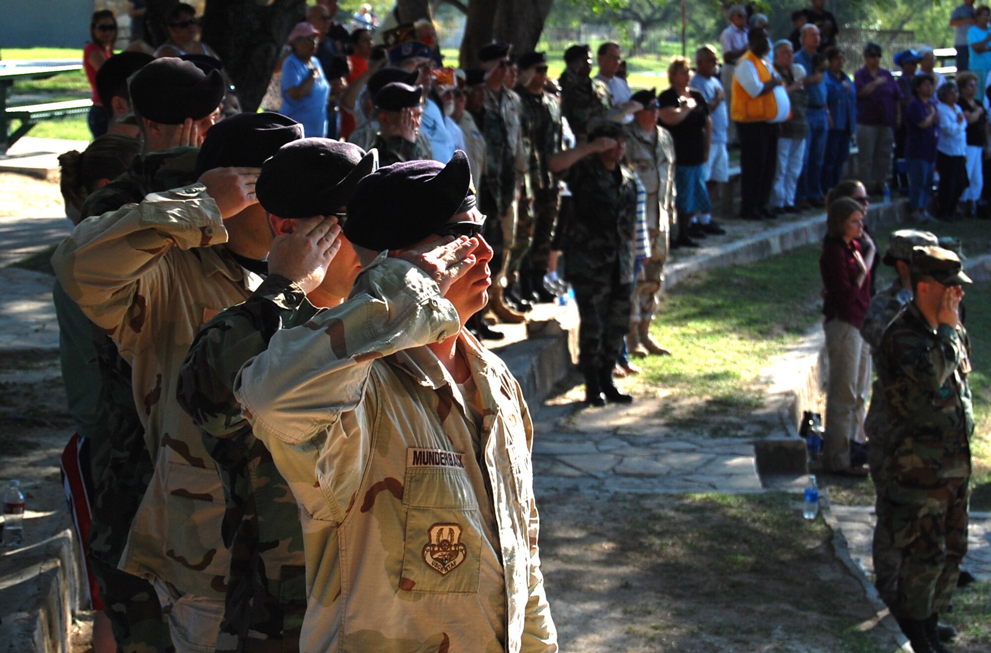 LAUGHLIN AIR FORCE BASE, Texas – Tech. Sgt. Frank Munderback, 47th Security Forces Squadron, salutes as the colors are retired at the National POW/MIA Recognition Day ceremony in Del Rio, Texas, Sept. 21. (U.S Air Force photo by Airman Sara Csurilla)