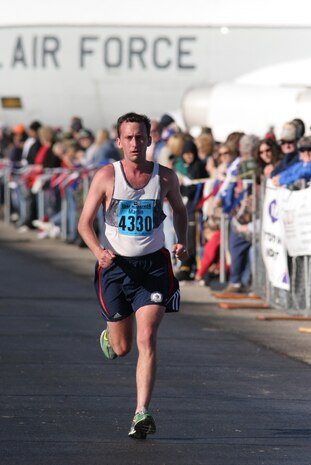 Capt. Martin Conrad, 11th Reconnaissance Squadron deputy chief of intelligence, races in the 11th Annual U.S. Air Force Half-Marathon at Wright-Patterson Air Force Base, Ohio, Sept. 15.  He finished fifth in the men’s category out of 1,121 competitors with a personal-record time of 1:15:59. (Photo courtesy of www.brightroom.com/Sean Walkinshaw)