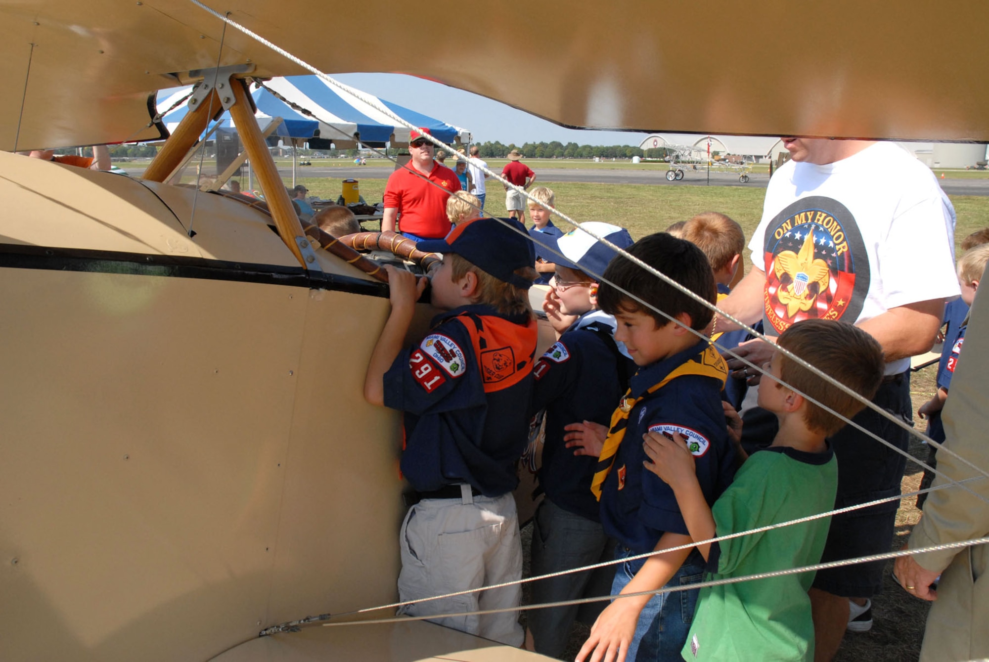 A group of Boy Scouts get a closer look inside one of the aircraft during the 2007 Dawn Patrol Rendezvous World War I Fly-In at the National Museum of the United States Air Force. (U.S. Air Force photo)