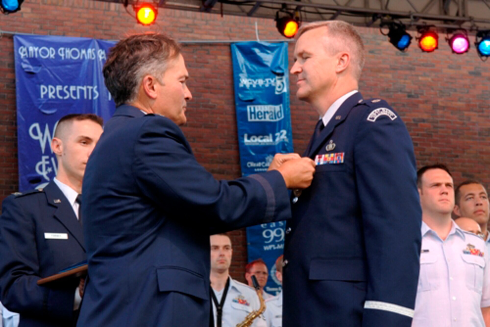 Maj Gen Rooney presents the Meritorious Service Medal