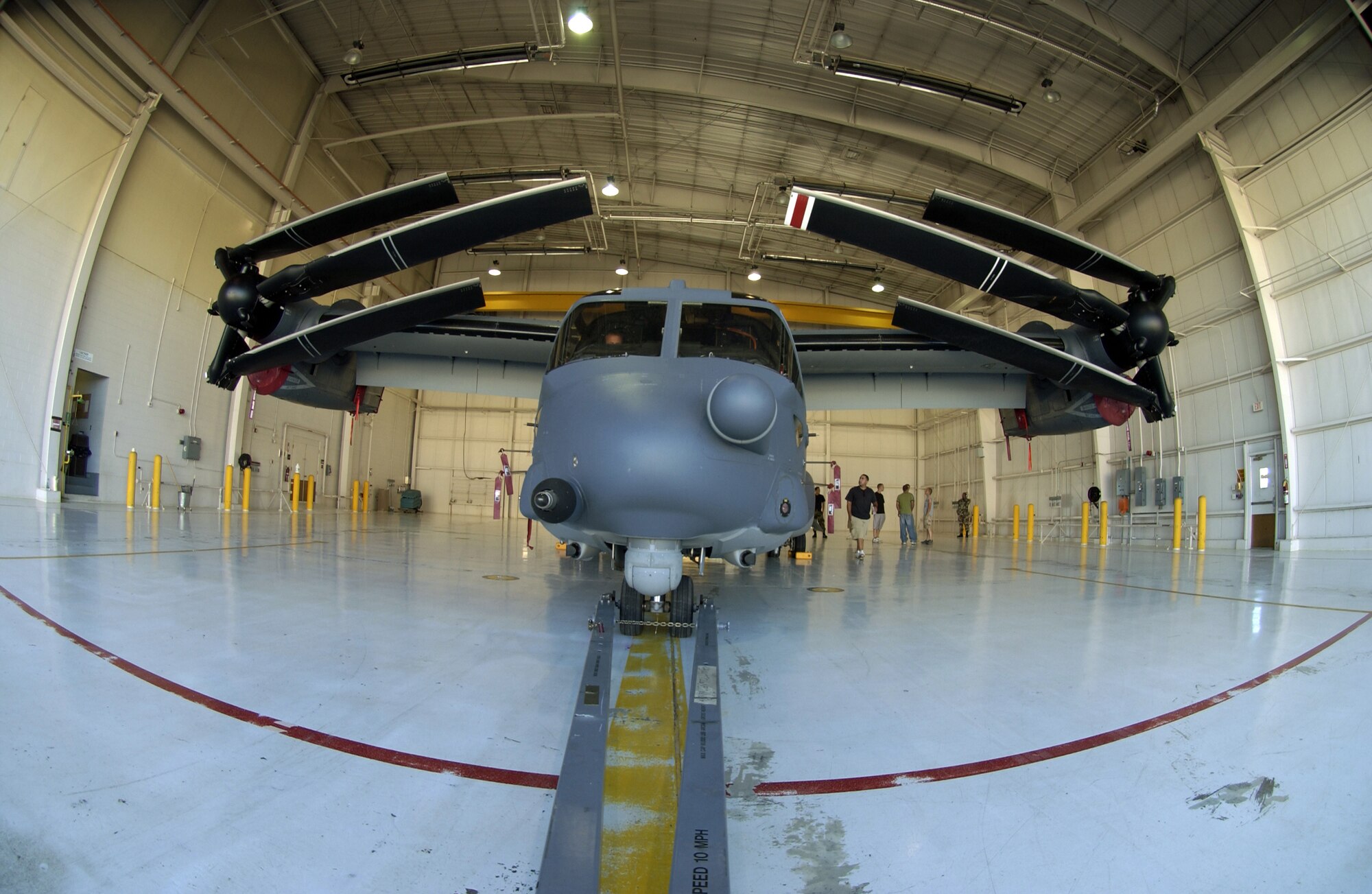 CANNON AIR FORCE BASE, N.M. -- A CV-22 Osprey with its rotors folded sits in a hangar at Cannon AFB, N.M., during a hangar clearance test on Sept. 25, 2007.  Cannon AFB will be transferred from Air Combat Command to Air Force Special Operations Command on Oct. 1.  Ospreys are among the special operations aircraft to be assigned to the 27th Special Operations Wing at Cannon.  (Air Force photo by Greg Allen)
