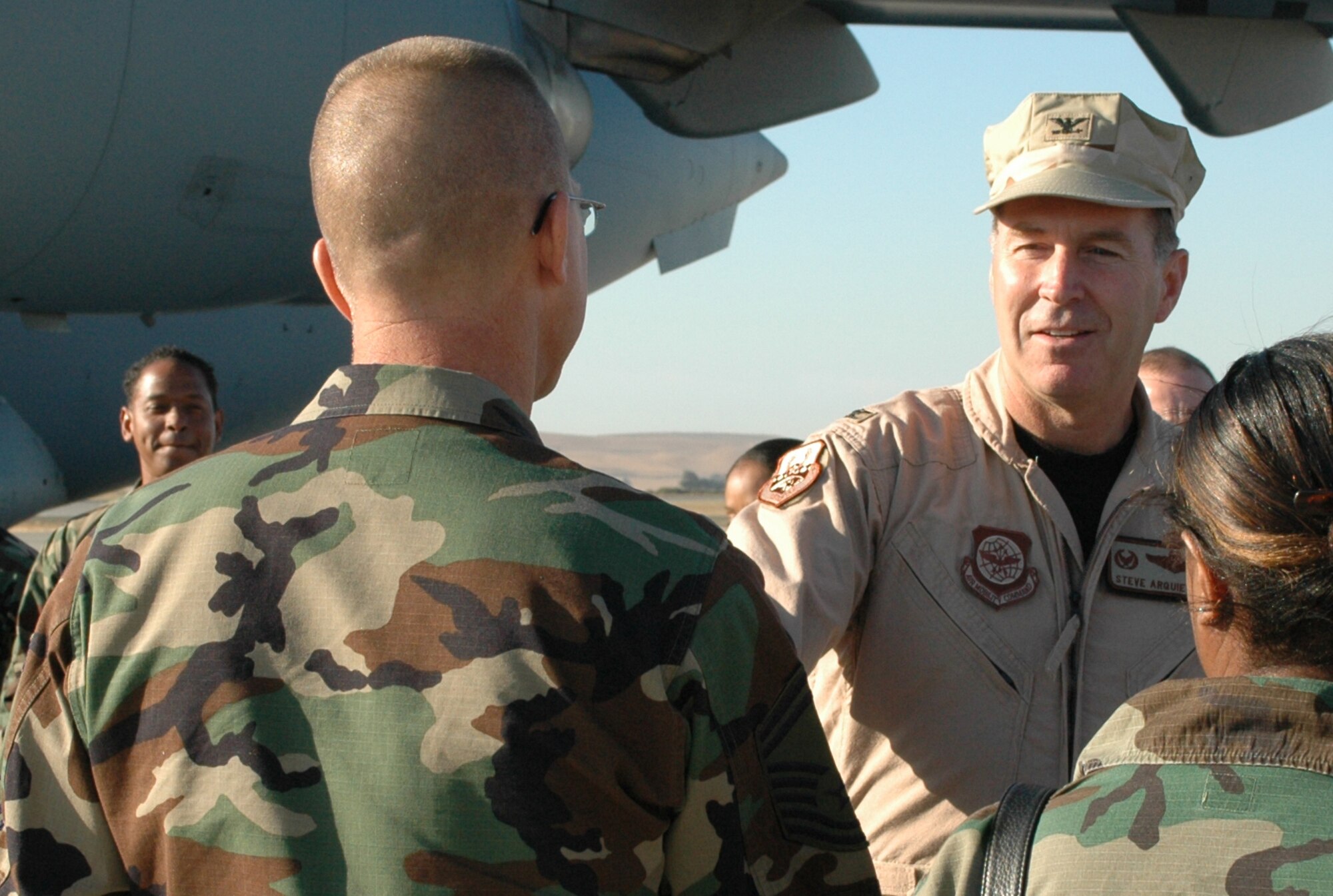 Col. Steve Arquiette, 60th Air Mobility Wing commander, bids a farewell to Team Travis members as he prepares to depart for a deployment Sept. 27. Colonel Arquiette will serve as the Deputy Director of Mobility Forces for Southwest Asia during his time overseas. (U.S Air Force photo/Airman 1st Class Kristen Rohrer)