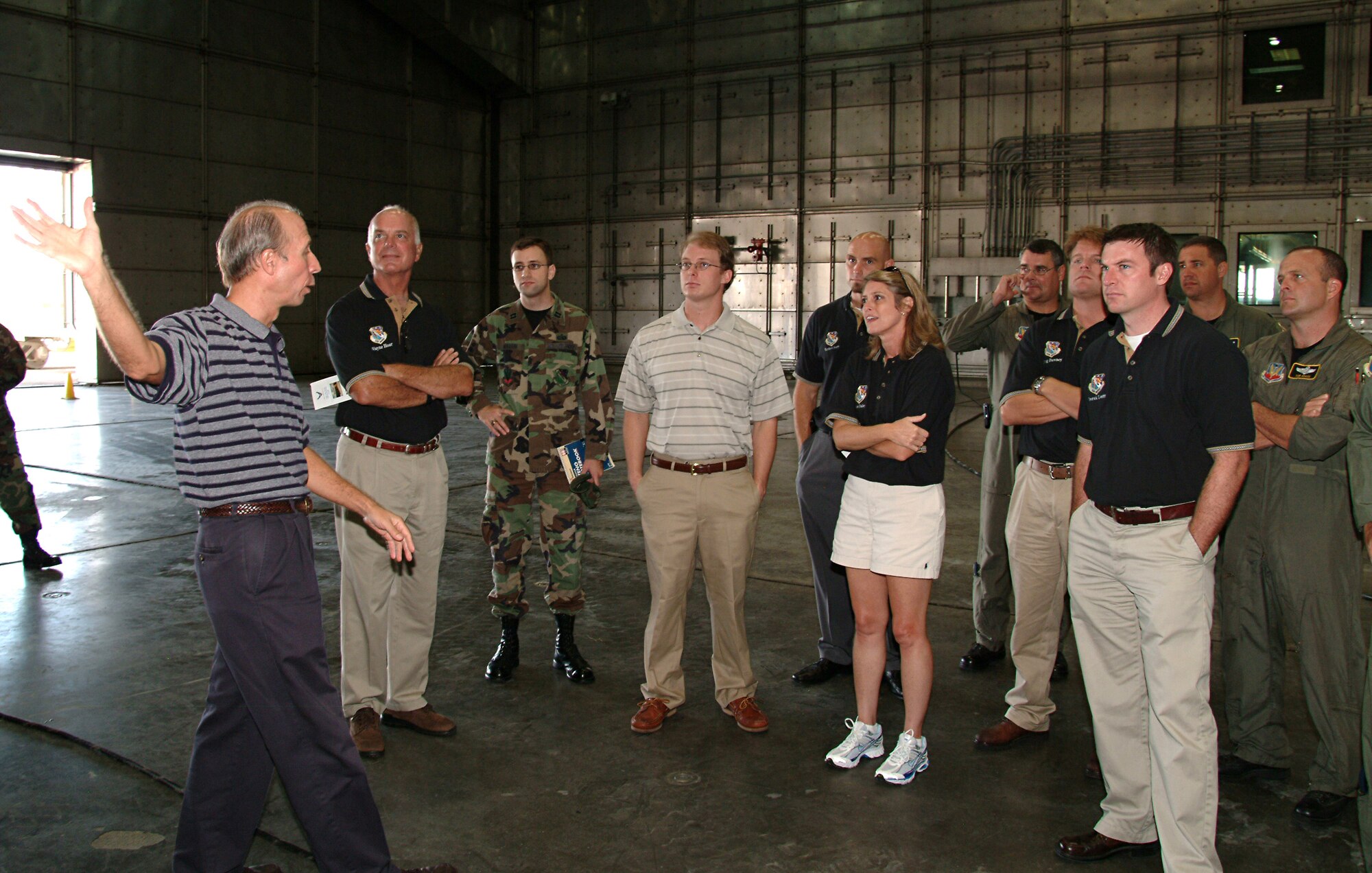 EGLIN AIR FORCE BASE, Fla. -- Kirk Velasco, Director of the McKinley Climatic Laboratory, showed the 53d Wing Honorary Commander inside the main chamber of the lab during a tour. The main chamber is the largest known insulated aircraft hangar, having a total enclosed volume of approximately 3,282,500 cubic feet.  Honorary Commanders at the tour were Wayne Hoar, 85th Test and Evaluation Squadron; Brian Burger, 36 Electronic Warfare Squadron; Matthew Avery, 16 EWS; Jeanne Dailey, 68 EWS; Greg Downey, 53rd Computer Systems Squadron, and Derek Lott, 29th Training Systems Squadron. (U.S. Air Force photo/TSgt. Andrew Leonhard)