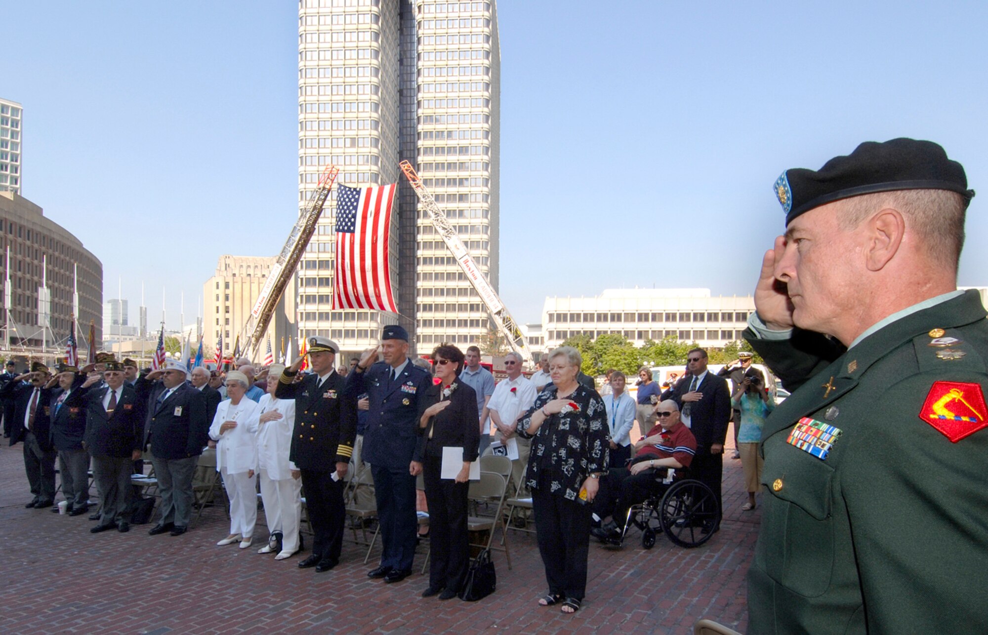 HANSCOM AFB, Mass. -- Maj. Jack McKenna, Massachusetts National Guard, renders a salute during a ceremony in Boston Sept. 21 held in honor of prisoners of war and servicemembers missing in action. The event was attended by Col. Tom Schluckebier, 66th Air Base Wing commander, as well as the Air Force Band of Liberty and many Airmen from Hanscom. (U.S. Air Force photo by Jan Abate)