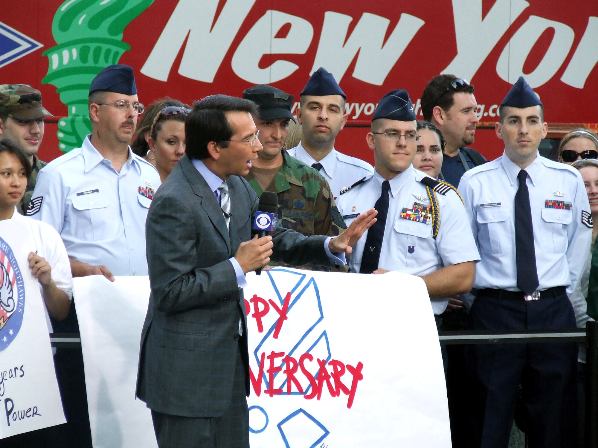 Weather anchor and feature reporter Dave Price from CBS' "The Early Show" talks on-air with Airmen from McGuire Air Force Base, N.J., and the Air Force Expeditionary Center at Fort Dix, N.J., along with cadets and cadre from the Manhattan College ROTC Det. 560 during filming for the show Sept. 26 in New York. Approximately 30 Airmen and cadets participated in the event observing the 60th anniversary of the Air Force. (U.S. Air Force Photo/Tech. Sgt. Scott T. Sturkol) 