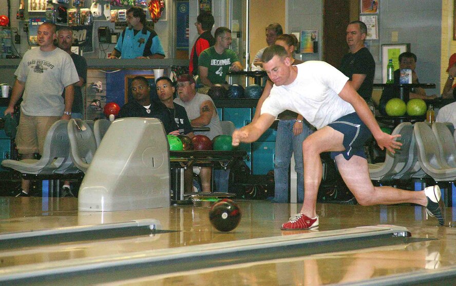 SHAW AIR FORCE BASE, S.C. -- Airman 1st Class Keith Jewett, 682nd Air Support Operations Squadron, throws a strike in the 9-pin no tap bowling tournament during the Viper Challenge Sept. 27. The Wing Sports Day Viper Challenge occurs annually with many different sporting events going on throughout the day. Unit teams are formed to participate in the events and the unit that has accumulated the most points at the conclusion of the last Viper Challenge event will be declared the winner and receive the coveted Commander's Cup. (U.S. Air Force/Senior Airman John Gordinier)
