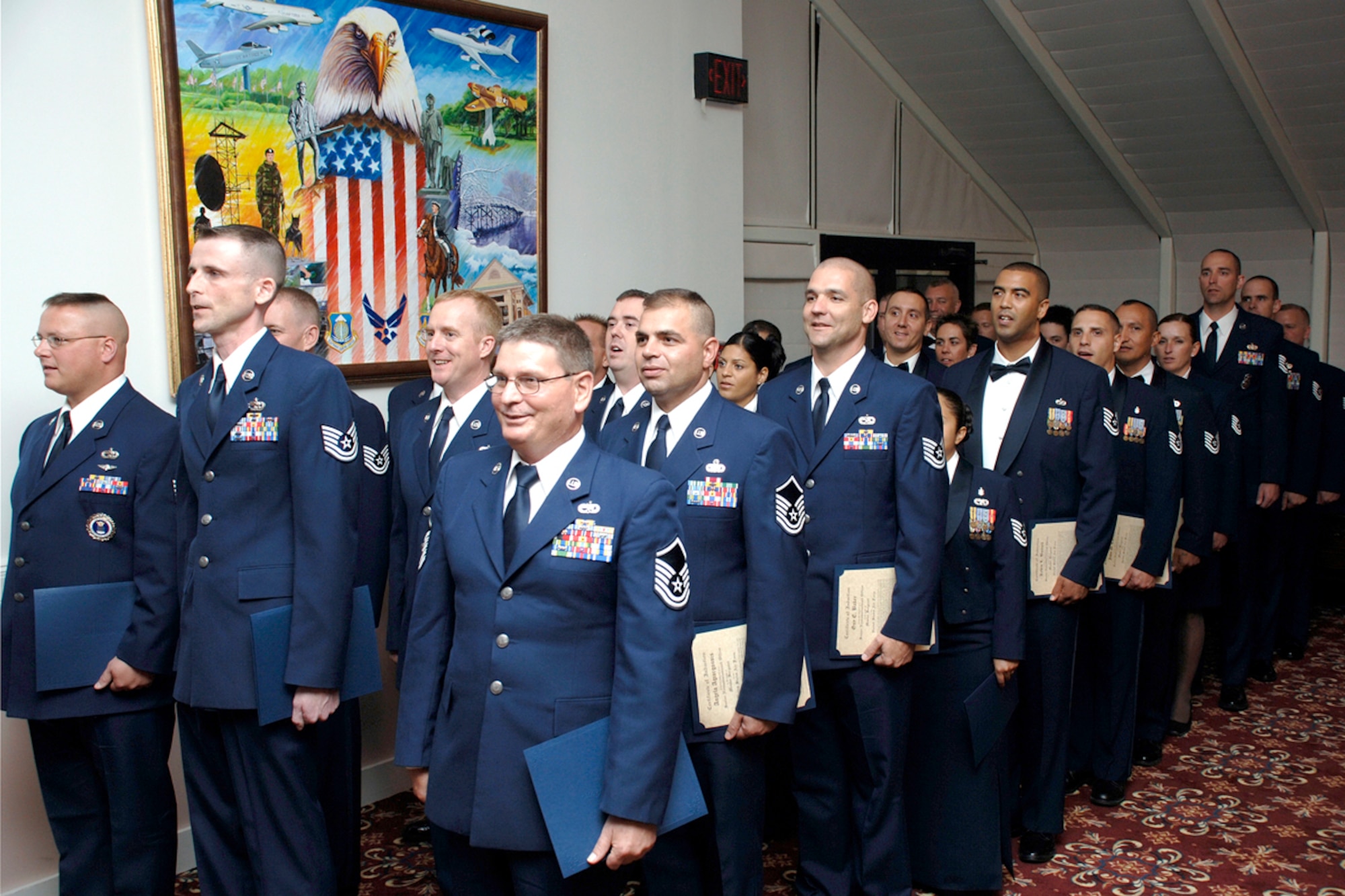 HANSCOM AFB, Mass. -- The newest Hanscom enlisted personnel to be included in the senior noncommissioned officer ranks are recognized during the Senior NCO Induction Ceremony Sept. 21 in the Minuteman Club. Air Force Materiel Command Chief, Chief Master Sgt. Jonathan Hake was the featured speaker during the event. (U.S. Air Force photo by Jan Abate)