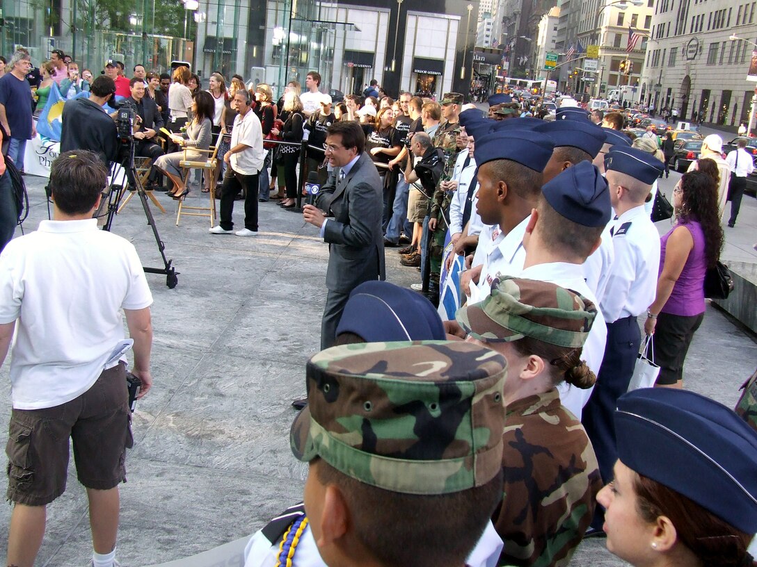 Dave Price from CBS' "The Early Show" talks on-air with Airmen from McGuire Air Force Base and the Air Force Expeditionary Center at Fort Dix, N.J., along with cadets and cadre from Manhattan College's ROTC Det. 560 during filming for the show Sept. 26 in New York. Mr. Price is a weather anchor and feature reporter for the show. Approximately 30 Airmen and cadets participated in the event observing the 60th anniversary of the Air Force. (U.S. Air Force Photo/Tech. Sgt. Scott Sturkol)