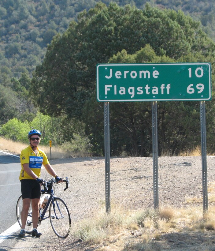 Retired Maj. Dale Weaver stops to rest before tackling the mountainous terrain south of Flagstaff, Ariz. July 8 during his bicycle journey across the United States. Mr. Weaver completed the cross-country journey in 45 days. (Courtesy photo/Lauren Weaver)