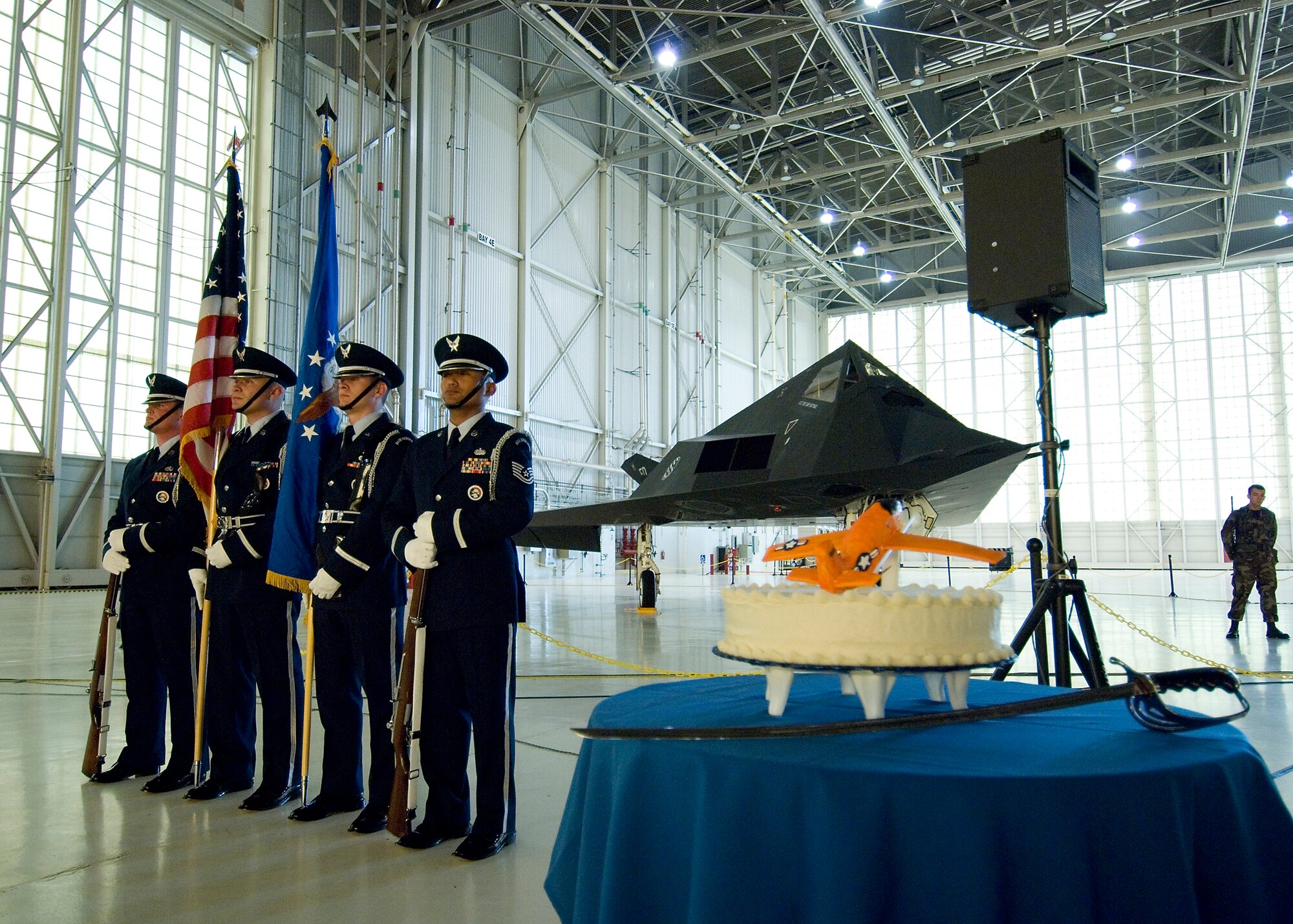 The Edwards Blue Eagles Honor Guard prepare to present the colors during the opening ceremonies for the Air Force Ball at hangar 1600 here Sept. 21. Celebrating the 60th anniversary of the Air Force, the night highlighted several distinguished visitors including the Secretary of the Air Force Michael W. Wynne and retired Brig. Gen. Chuck Yeager. (Photo by Edward Cannon)