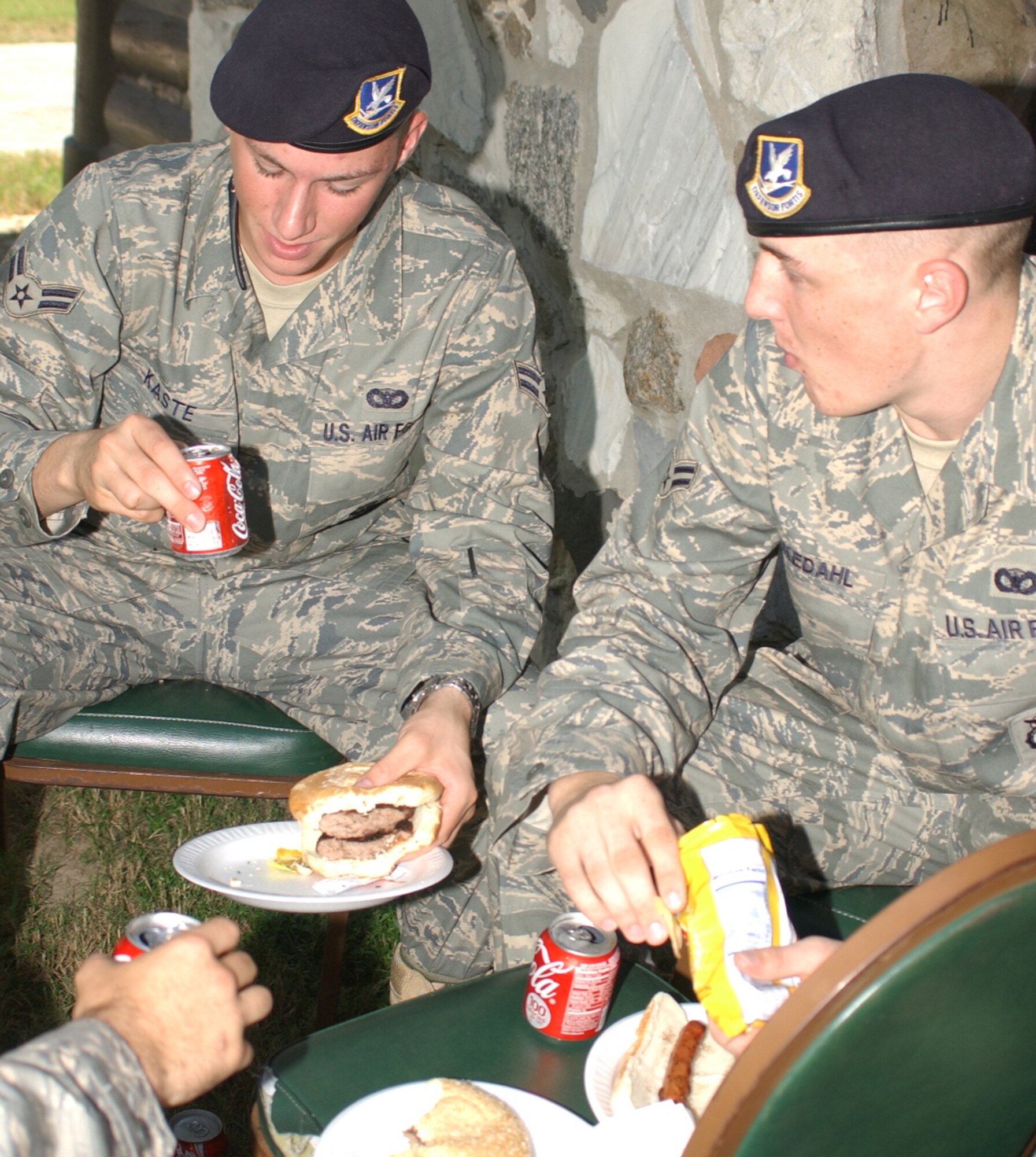 Airmen 1st Class Steven Kaste, left, and Haakon Folkedahl, 81st Security Forces Squadron, enjoy themselves at a birthday picnic and welcome home to deployed troops at marina park Sept. 19. (U.S. Air Force photo by Kemberly Groue)