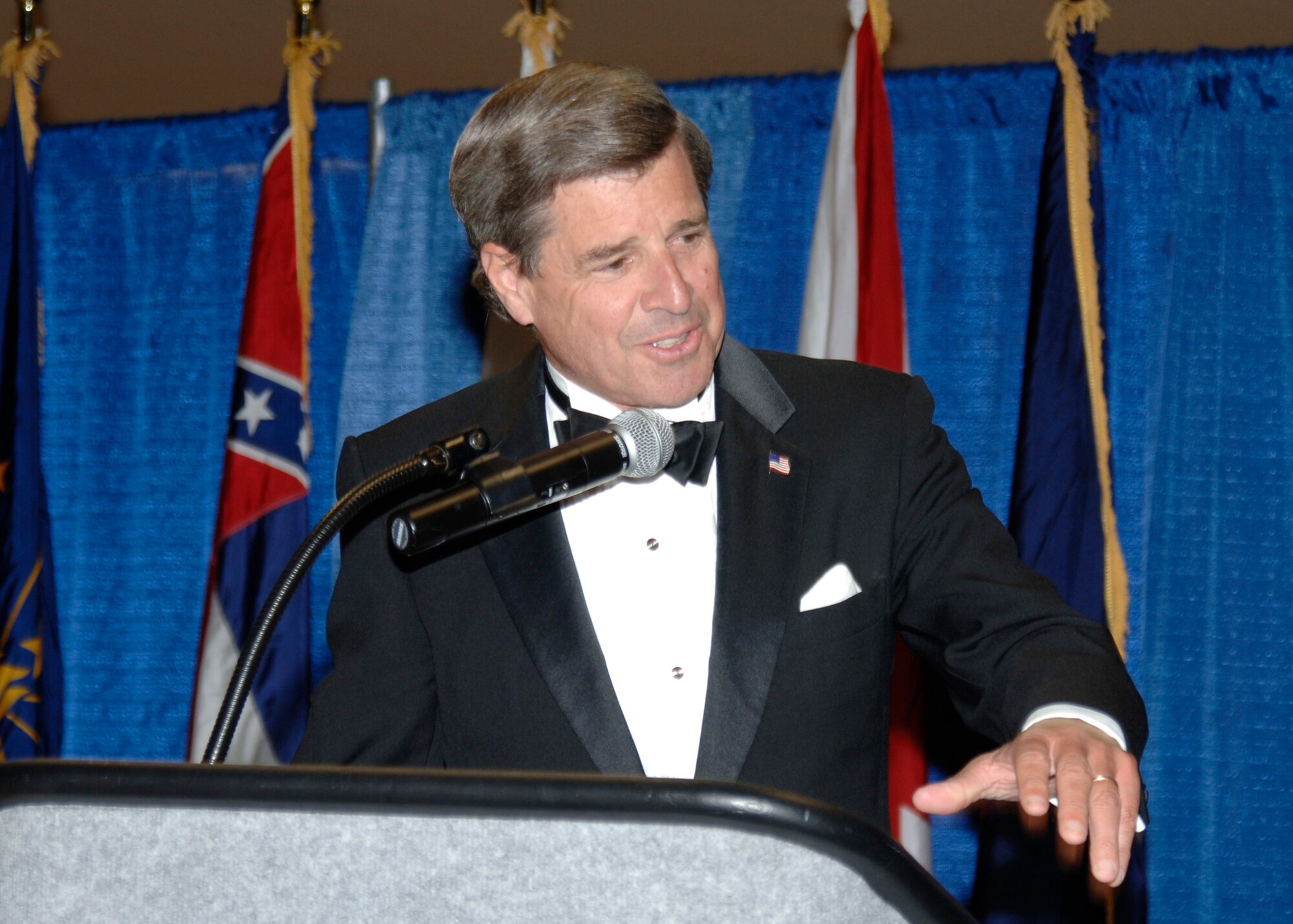 MCCONNELL AIR FORCE BASE, Kan. --  Ambassador L. Paul Bremer III speaks to the 720 guests in attendance at the 60th Anniversary Air Force Ball, Sept. 15 at the Century II Convention center, Wichita.  The ambassador discussed his time in spent Iraq and the changes that have been made within the country. Ambassador Bremer helped to restore the infrastructure and military of Iraq as well as establish an election system for government officials. (photo by Airman 1st  Class Justin Shelton)