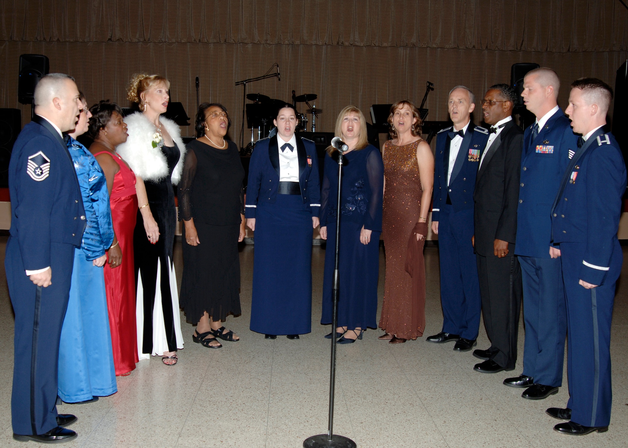 MCCONNELL AIR FORCE BASE, Kan. --  The Voices of McConnell, gathered to sing the National Anthem at the start of the 60th Anniversary Air Force Ball, Sept. 15, at the Century II Convention center, Wichita. (photo by Airman 1st Class Justin Shelton) 