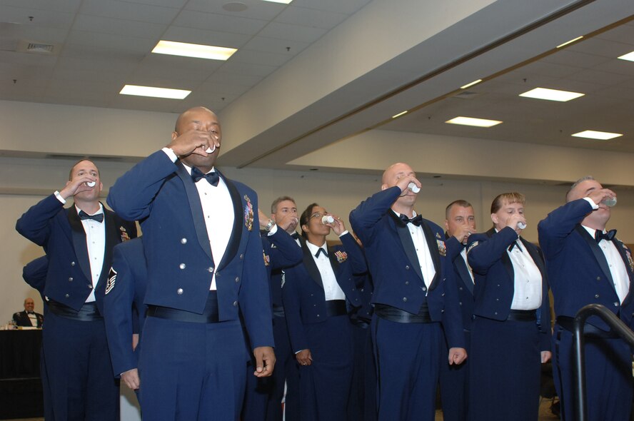 Dyess first sergeants toast "to the mess" during the 24th Annual Enlisted Dining Out Sept. 14. 
