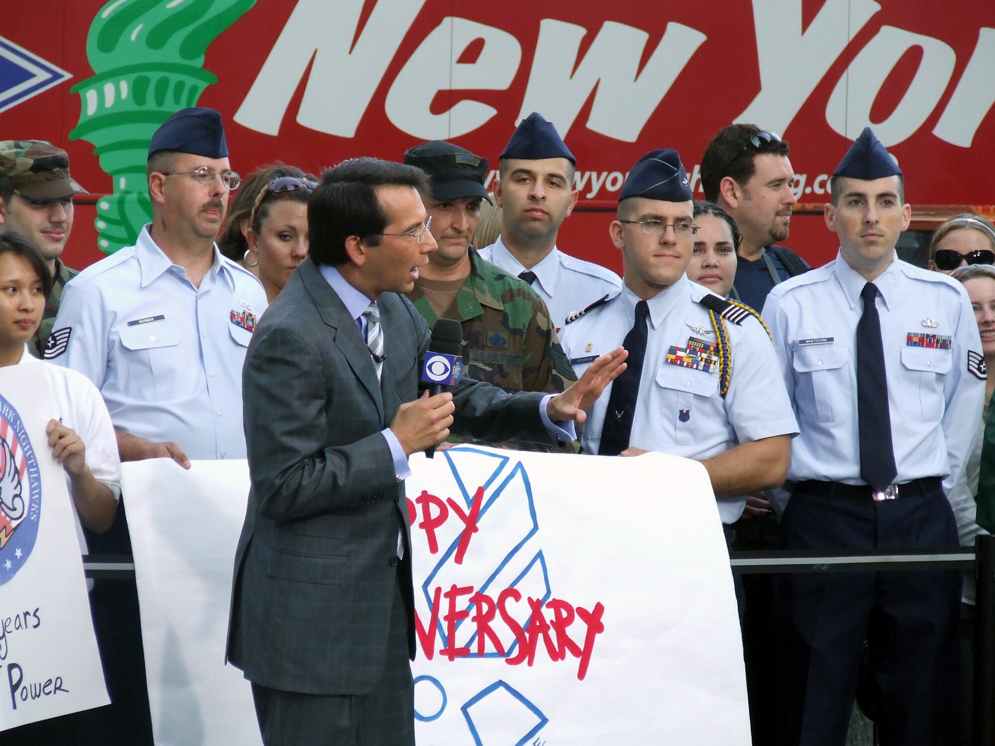 Weather anchor and feature reporter Dave Price from CBS' The Early Show talks on-air with Airmen from McGuire Air Force Base and the U.S. Air Force Expeditionary Center at Fort Dix, N.J., along with cadets and cadre from Det. 560 of the Reserve Officer Training Corps at Manhattan College during fiming for the show Sept. 26, 2007, in New Yorkl City.  Approximately 30 Airmen and cadets participated in the event observing the 60th anniversary of the Air Force.  (U.S. Air Force Photo/Tech. Sgt. Rebecca Danet)