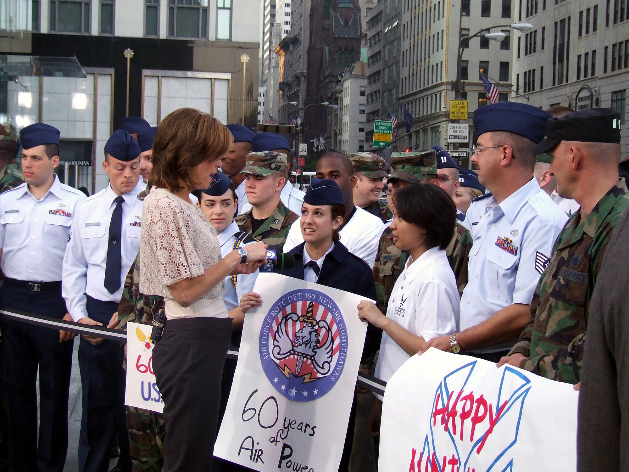 Anchor Hannah Storm from CBS' The Early Show greets Airmen from McGuire Air Force Base and the U.S. Air Force Expeditionary Center at Fort Dix, N.J., along with cadets and cadre from Det. 560 of the Reserve Officer Training Corps at Manhattan College during fiming for the show Sept. 26, 2007, in New York City.  Approximately 30 Airmen and cadets participated in the event observing the 60th anniversary of the Air Force.  (U.S. Air Force Photo/Tech. Sgt. Rebecca Danet)
