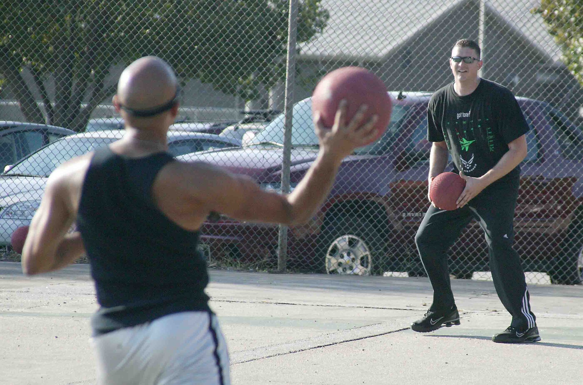 SHAW AIR FORCE BASE, S.C. -- Staff Sgt. Jarod Jones, 20th Equipment Maintenance Squadron, throws the ball to Staff Sgt. Wesley Rudin, 20th EMS, in a dodge-ball practice game during the Viper Challenge Sept. 27. The Wing Sports Day Viper Challenge occurs annually with many different sporting events going on throughout the day. Unit teams are formed to participate in the events and the unit that has accumulated the most points at the conclusion of the last Viper Challenge event will be declared the winner and receive the coveted Commander's Cup. (U.S. Air Force/Senior Airman John Gordinier)
