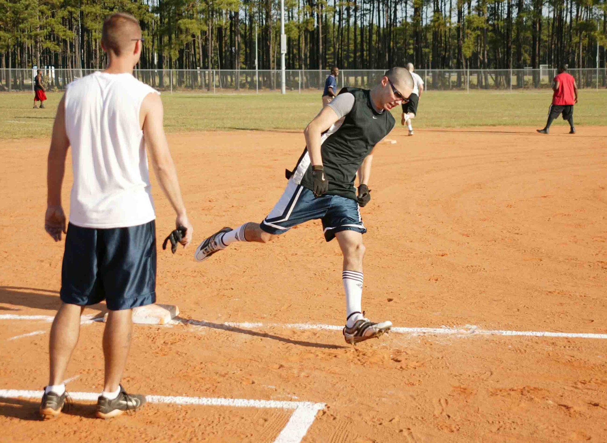 SHAW AIR FORCE BASE, S.C. -- Airman 1st Class Christopher Ramos, 9th Operational Weather Squadron, rounds third base to score during the 1-pitch softball tournament during the Viper Challenge Sept. 27. The Wing Sports Day Viper Challenge occurs annually with many different sporting events going on throughout the day. Unit teams are formed to participate in the events and the unit that has accumulated the most points at the conclusion of the last Viper Challenge event will be declared the winner and receive the coveted Commander's Cup. (U.S. Air Force photo/Tech. Sgt. Kevin Williams)