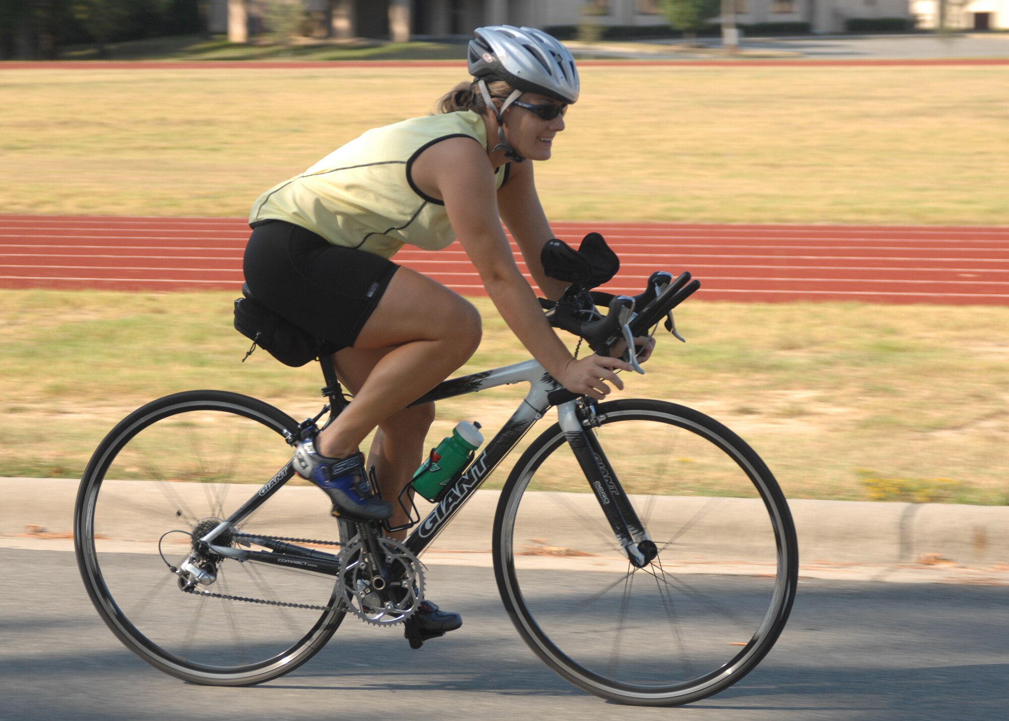 SEYMOUR JOHNSON AIR FORCE BASE, N.C. - Diane Giefer finishes up the bike portion of the triathlon race.  The race, which consisted of lap swimming, a 15 mile bike ride, and a 4 mile run was hosted by the 4th Services Squadron September 8, 2007. (U.S. Air Force photo by Senior Airman Chad Trujillo)